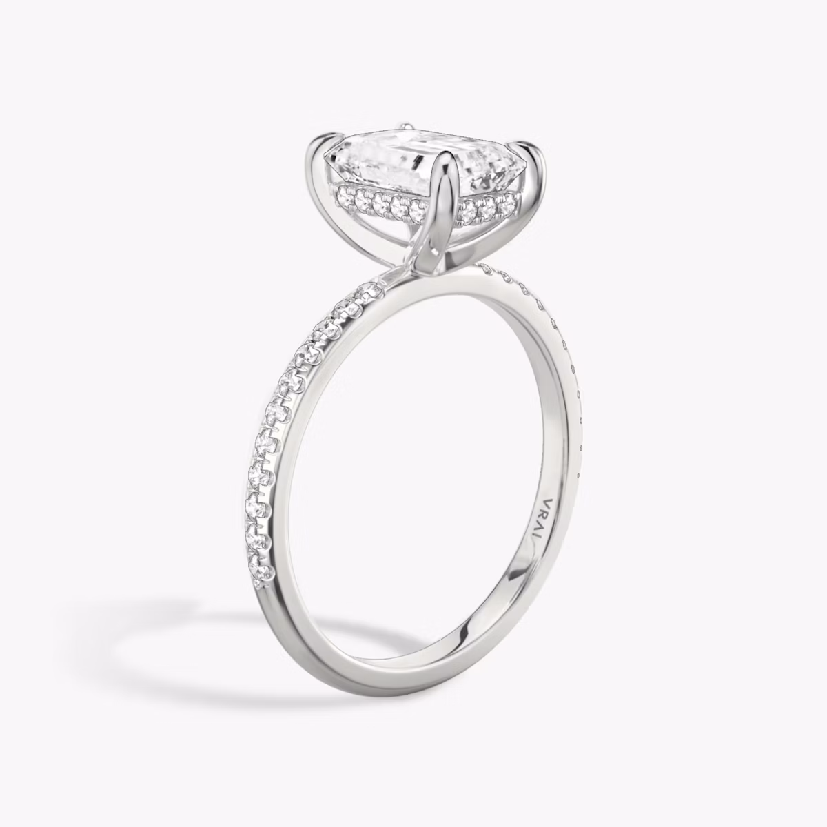 The Classic Hidden Halo | Emerald | Platinum | bandAccent: Pavé | bandWidth: standard | prongStyle: Plain | diamondOrientation: vertical | caratWeight: other