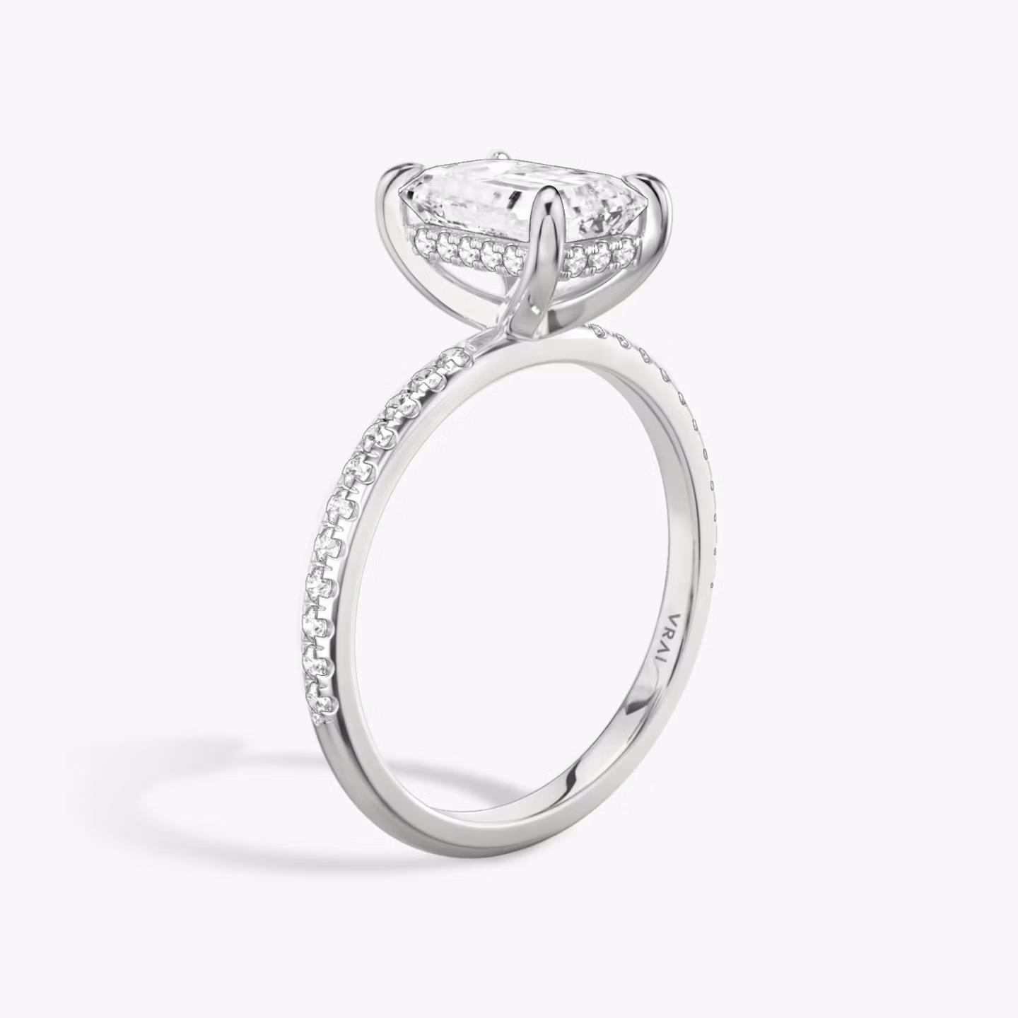 The Classic Hidden Halo | Emerald | Platinum | bandAccent: Pavé | bandWidth: standard | prongStyle: Plain | diamondOrientation: vertical | caratWeight: other