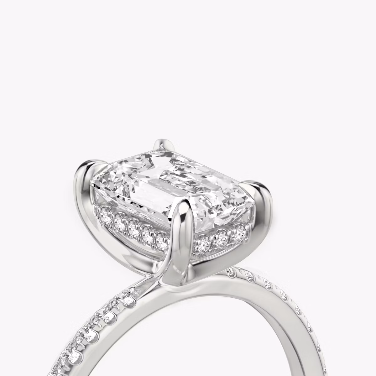 The Classic Hidden Halo | Emerald | Platinum | bandAccent: Pavé | bandWidth: standard | prongStyle: Plain | diamondOrientation: vertical | caratWeight: other