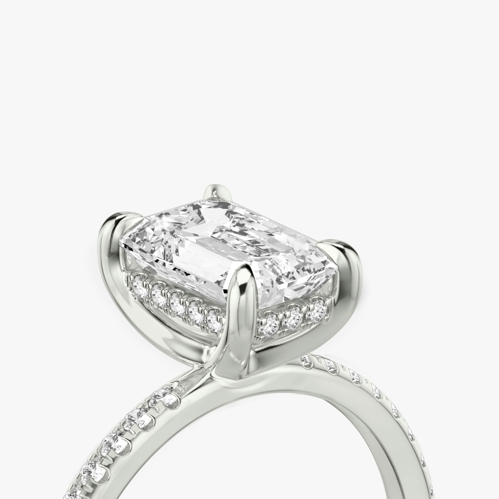 The Classic Hidden Halo | Emerald | 18k | White Gold | bandAccent: Pavé | bandWidth: standard | prongStyle: Plain | diamondOrientation: vertical | caratWeight: other