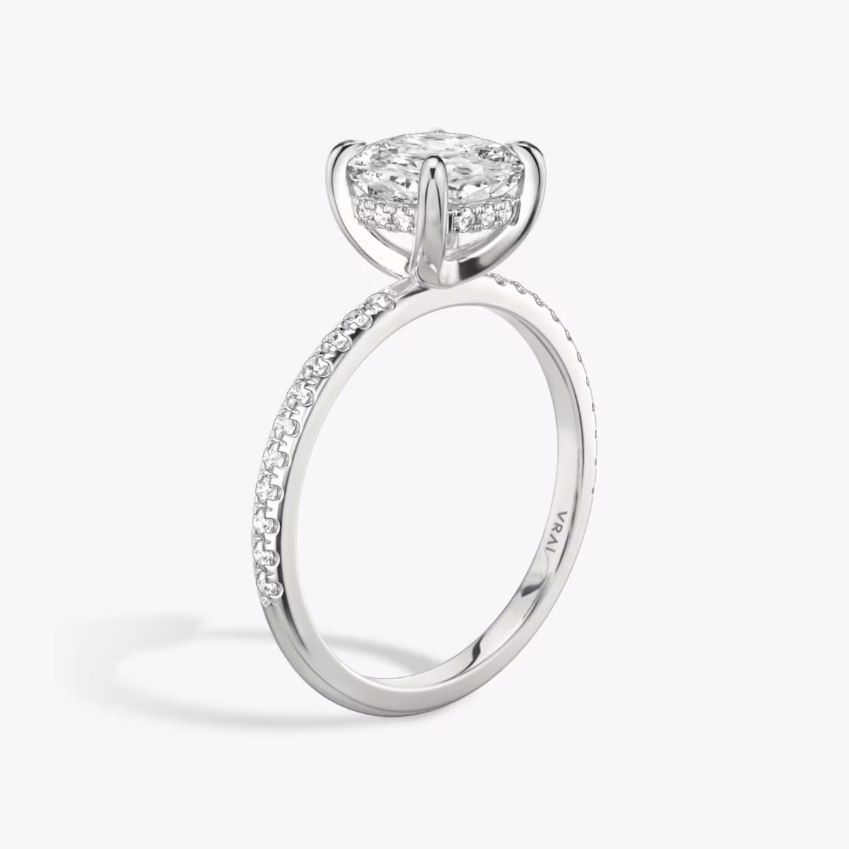 The Classic Hidden Halo | Cushion | Platinum | bandAccent: Pavé | bandWidth: standard | prongStyle: Plain | diamondOrientation: vertical | caratWeight: other