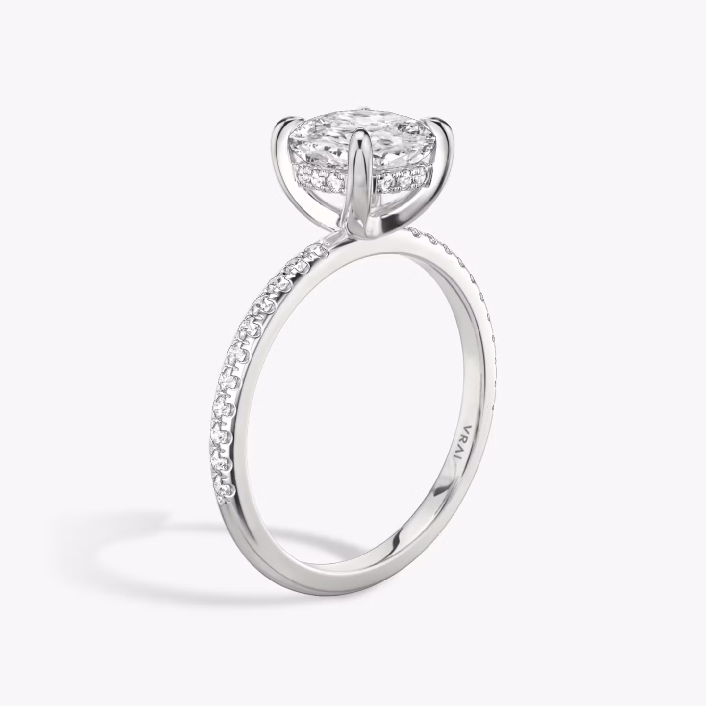 The Classic Hidden Halo | Cushion | Platinum | bandAccent: Pavé | bandWidth: standard | prongStyle: Plain | diamondOrientation: vertical | caratWeight: other