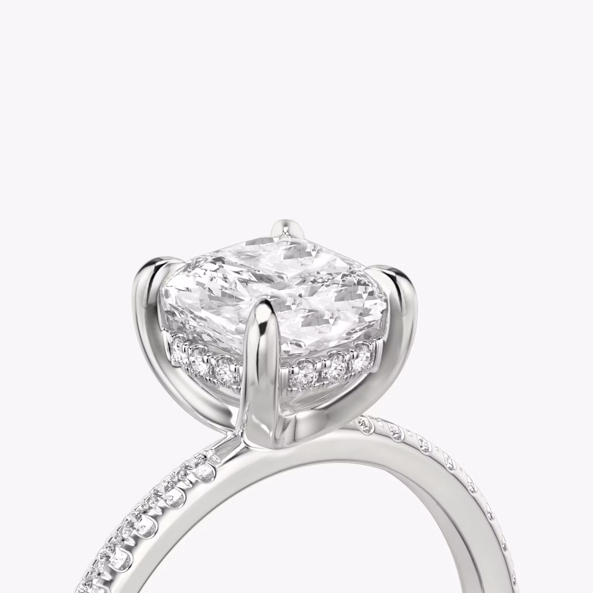 The Classic Hidden Halo | Cushion | Platinum | bandAccent: Pavé | bandWidth: standard | prongStyle: Plain | diamondOrientation: vertical | caratWeight: other