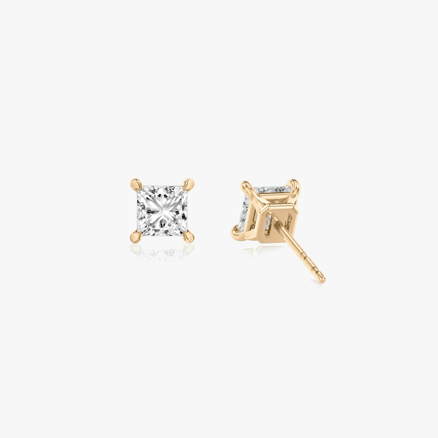 Two studs with a princess cut diamond in rose gold back view