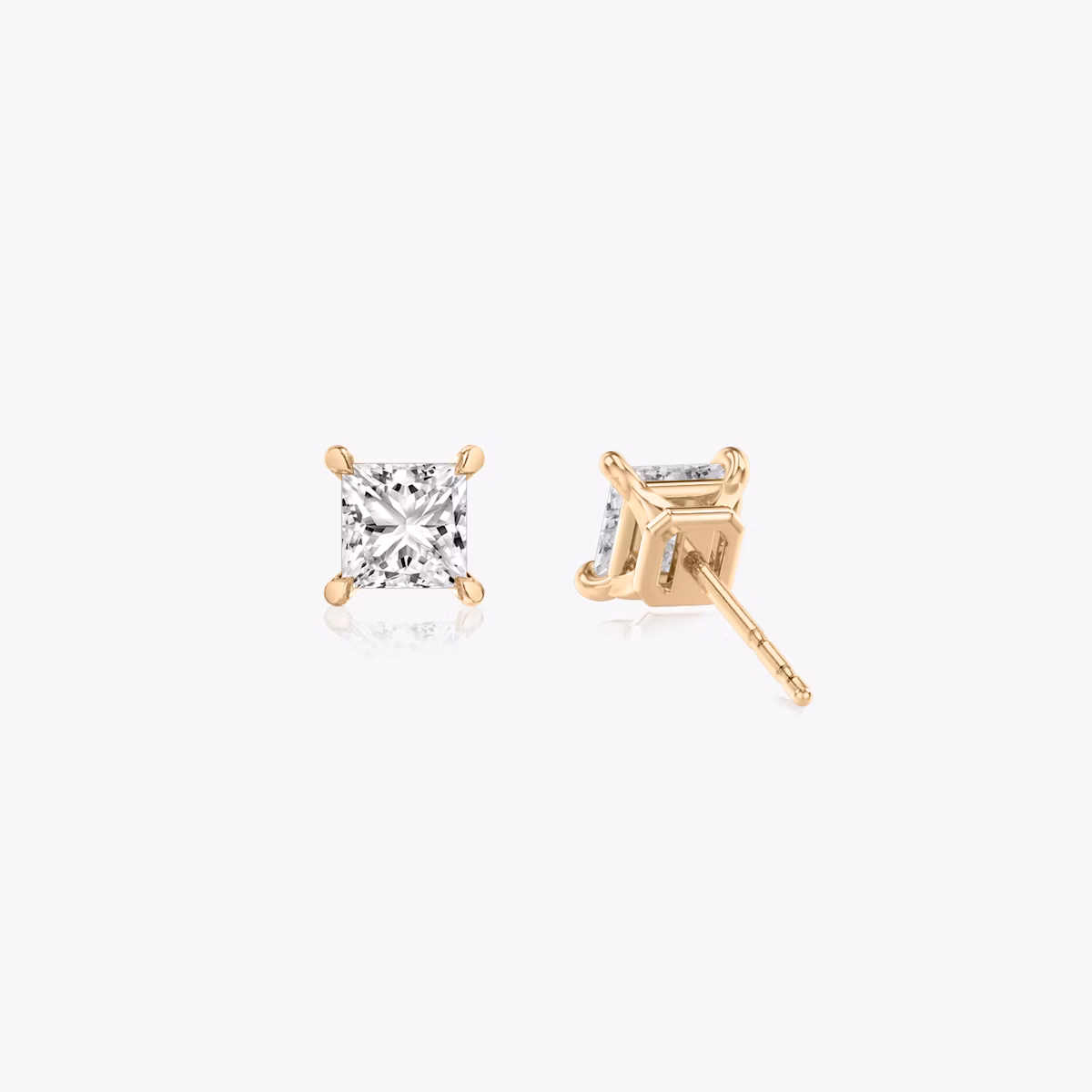 Two studs with a princess cut diamond in rose gold back view