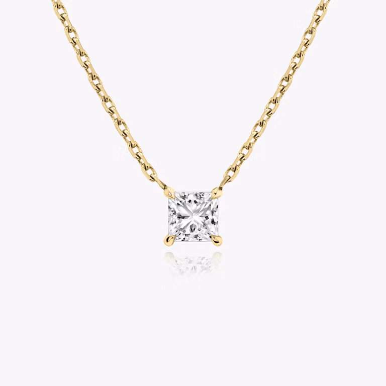 Princess cut diamond necklace in yellow gold front view
