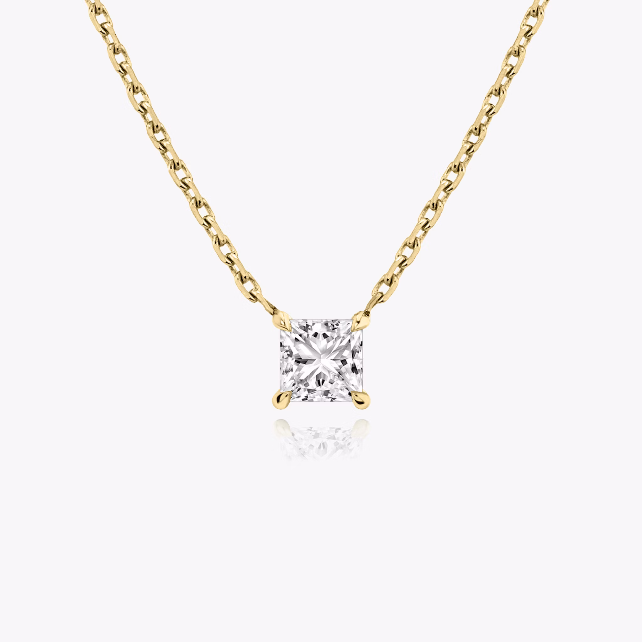Princess cut diamond necklace in yellow gold front view