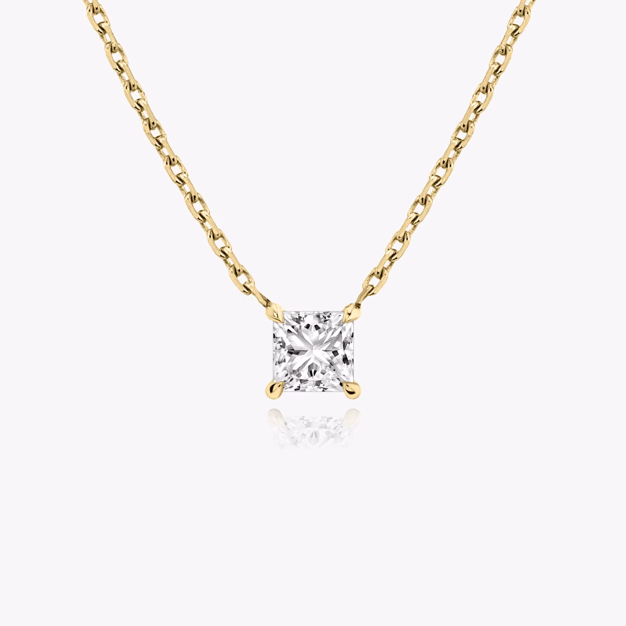 Princess cut diamond necklace in yellow gold front view