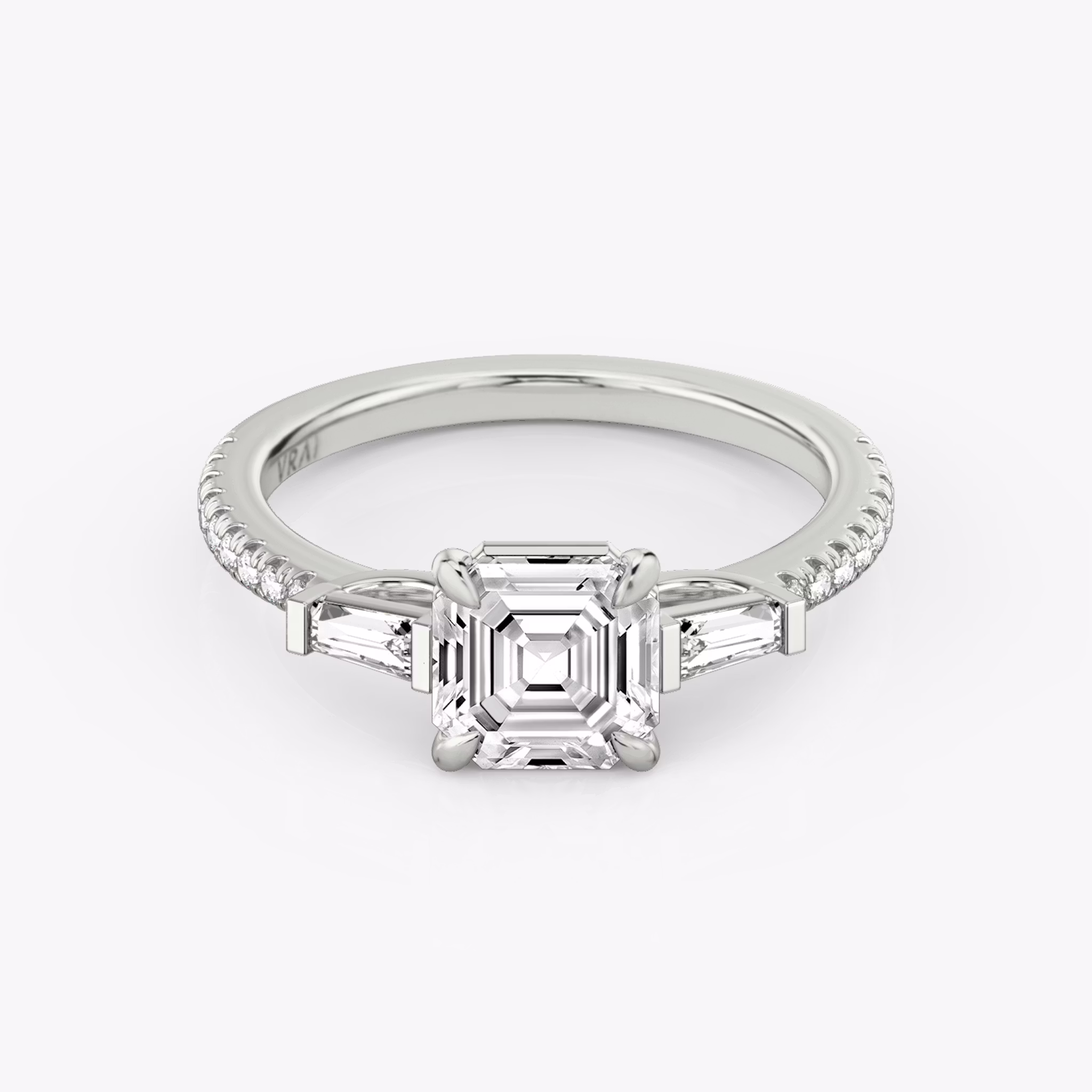 The Three Stone | Asscher | Platinum | bandAccent: Pavé | sideStoneCarat: 0.10ct | sideStoneShape: Tapered Baguette | diamondOrientation: vertical | caratWeight: other
