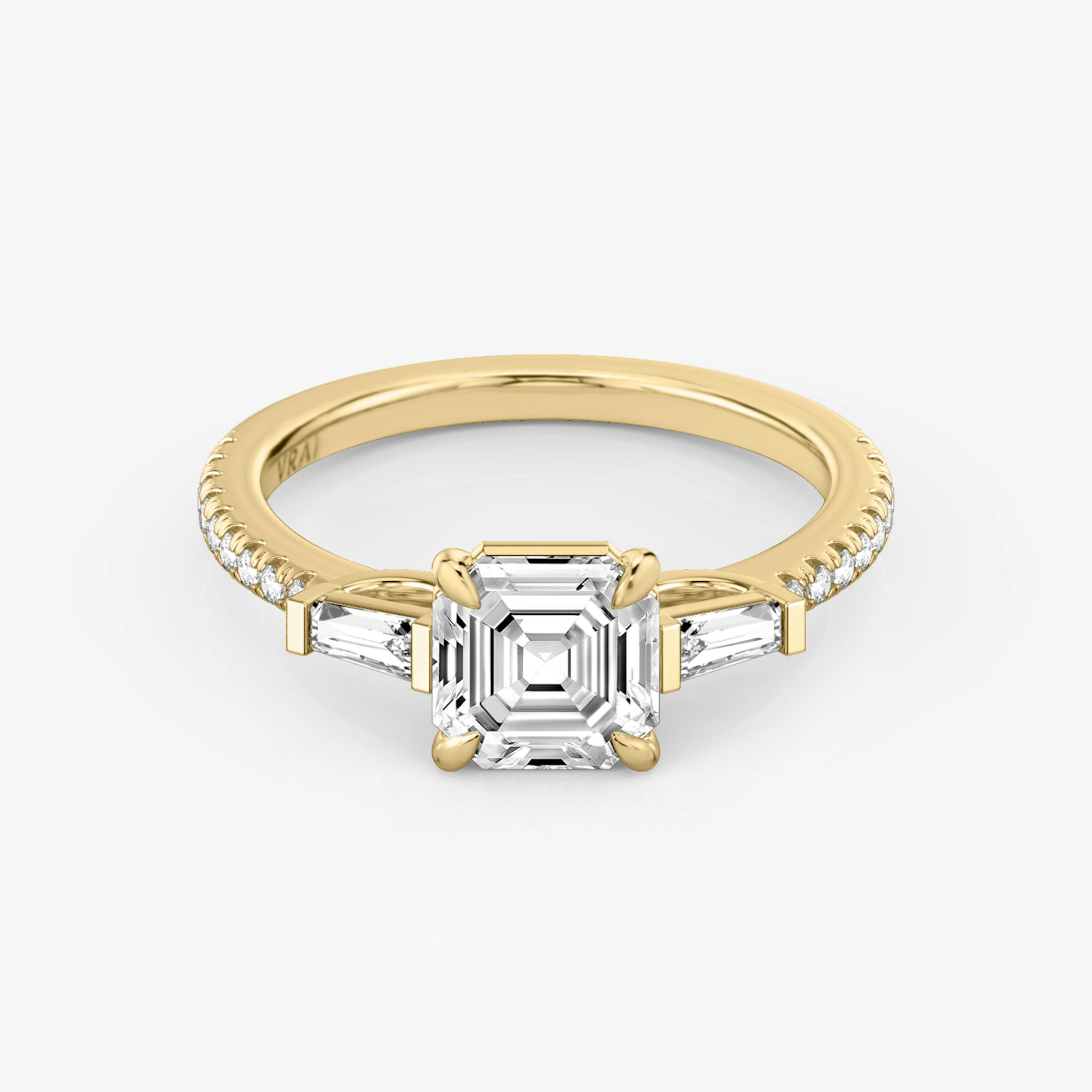 The Three Stone | Asscher | 18k | Yellow Gold | bandAccent: Pavé | sideStoneCarat: 0.10ct | sideStoneShape: Tapered Baguette | diamondOrientation: vertical | caratWeight: other