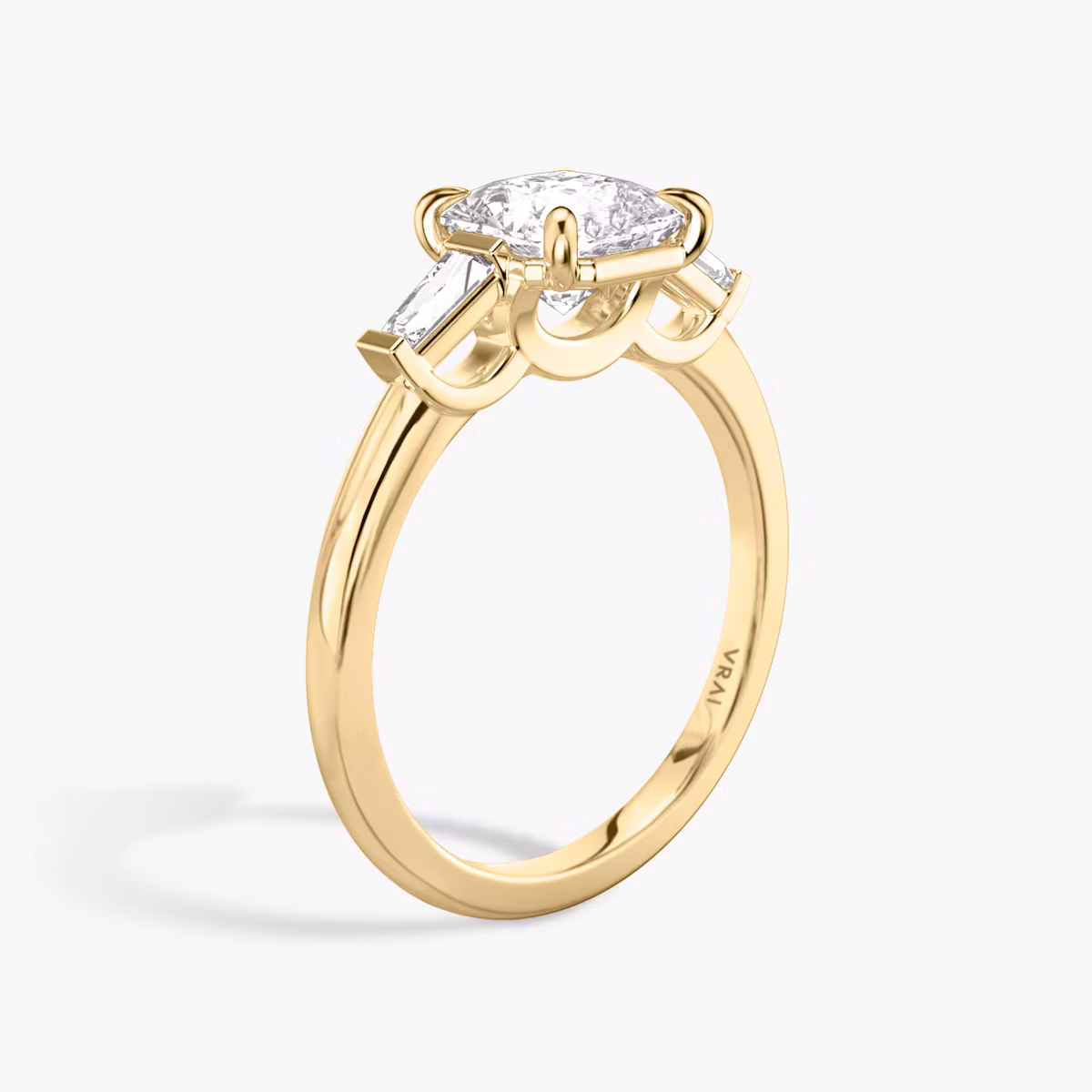 The Three Stone | Asscher | 18k | Yellow Gold | bandAccent: Plain | sideStoneCarat: 0.10ct | sideStoneShape: Tapered Baguette | diamondOrientation: vertical | caratWeight: other