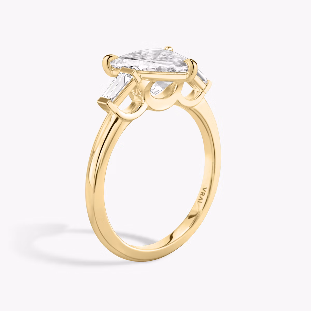 The Three Stone | Trillion | 18k | Yellow Gold | bandAccent: Plain | sideStoneCarat: 0.10ct | sideStoneShape: Tapered Baguette | diamondOrientation: vertical | caratWeight: other