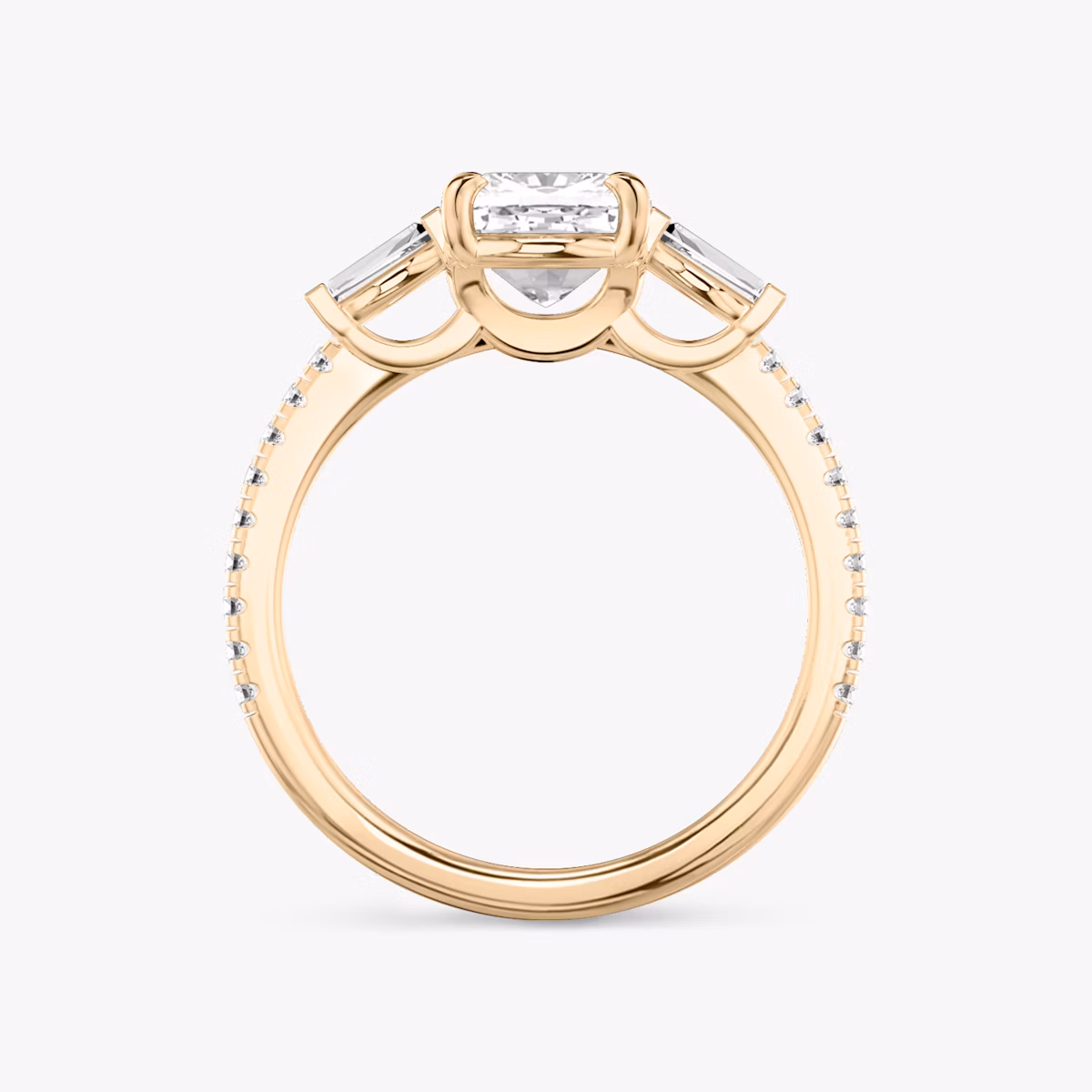 The Three Stone | Cushion | 14k | Rose Gold | bandAccent: Pavé | sideStoneCarat: 0.10ct | sideStoneShape: Tapered Baguette | diamondOrientation: vertical | caratWeight: other