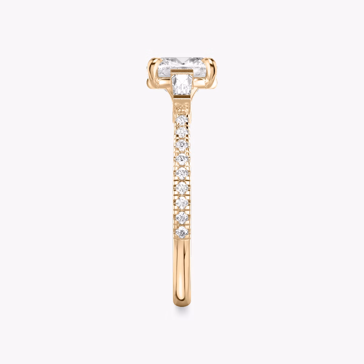 The Three Stone | Cushion | 14k | Rose Gold | bandAccent: Pavé | sideStoneCarat: 0.10ct | sideStoneShape: Tapered Baguette | diamondOrientation: vertical | caratWeight: other
