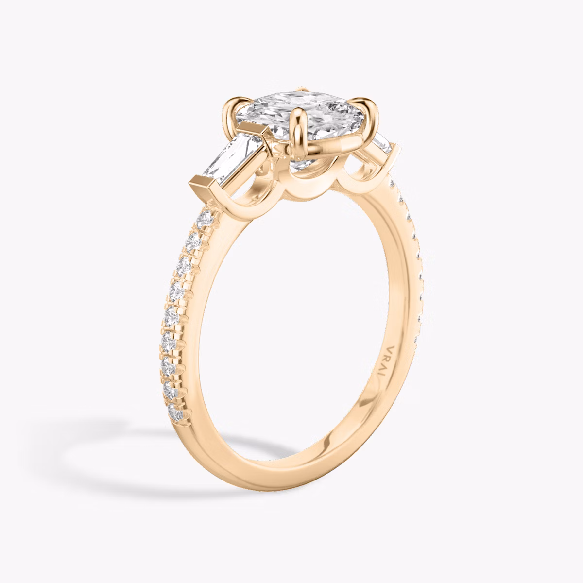 The Three Stone | Cushion | 14k | Rose Gold | bandAccent: Pavé | sideStoneCarat: 0.10ct | sideStoneShape: Tapered Baguette | diamondOrientation: vertical | caratWeight: other