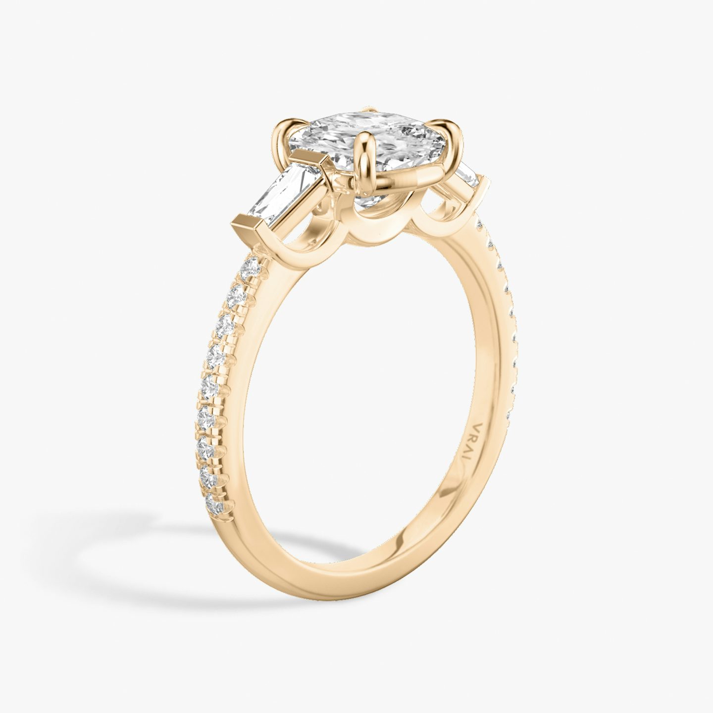 The Three Stone | Cushion | 14k | Rose Gold | bandAccent: Pavé | sideStoneCarat: 0.10ct | sideStoneShape: Tapered Baguette | diamondOrientation: vertical | caratWeight: other
