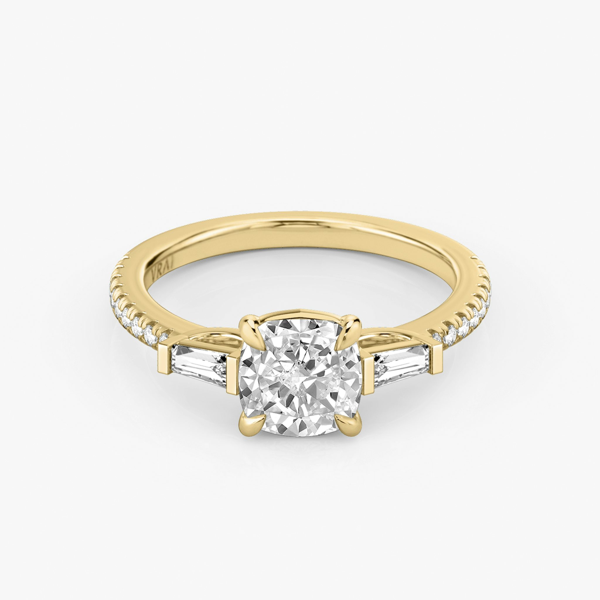 The Three Stone | Cushion | 18k | Yellow Gold | bandAccent: Pavé | sideStoneCarat: 0.10ct | sideStoneShape: Tapered Baguette | diamondOrientation: vertical | caratWeight: other