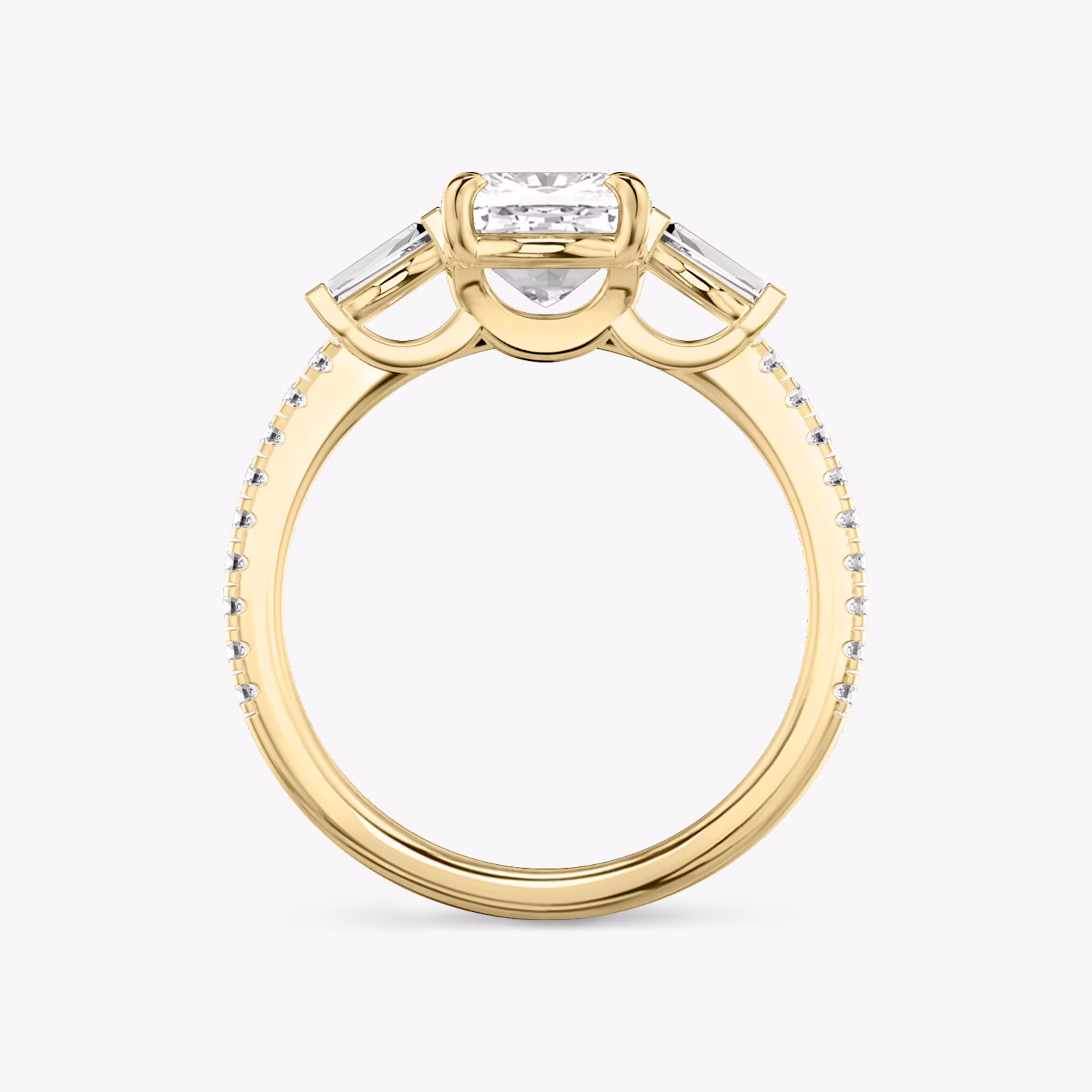 The Three Stone | Cushion | 18k | Yellow Gold | bandAccent: Pavé | sideStoneCarat: 0.10ct | sideStoneShape: Tapered Baguette | diamondOrientation: vertical | caratWeight: other