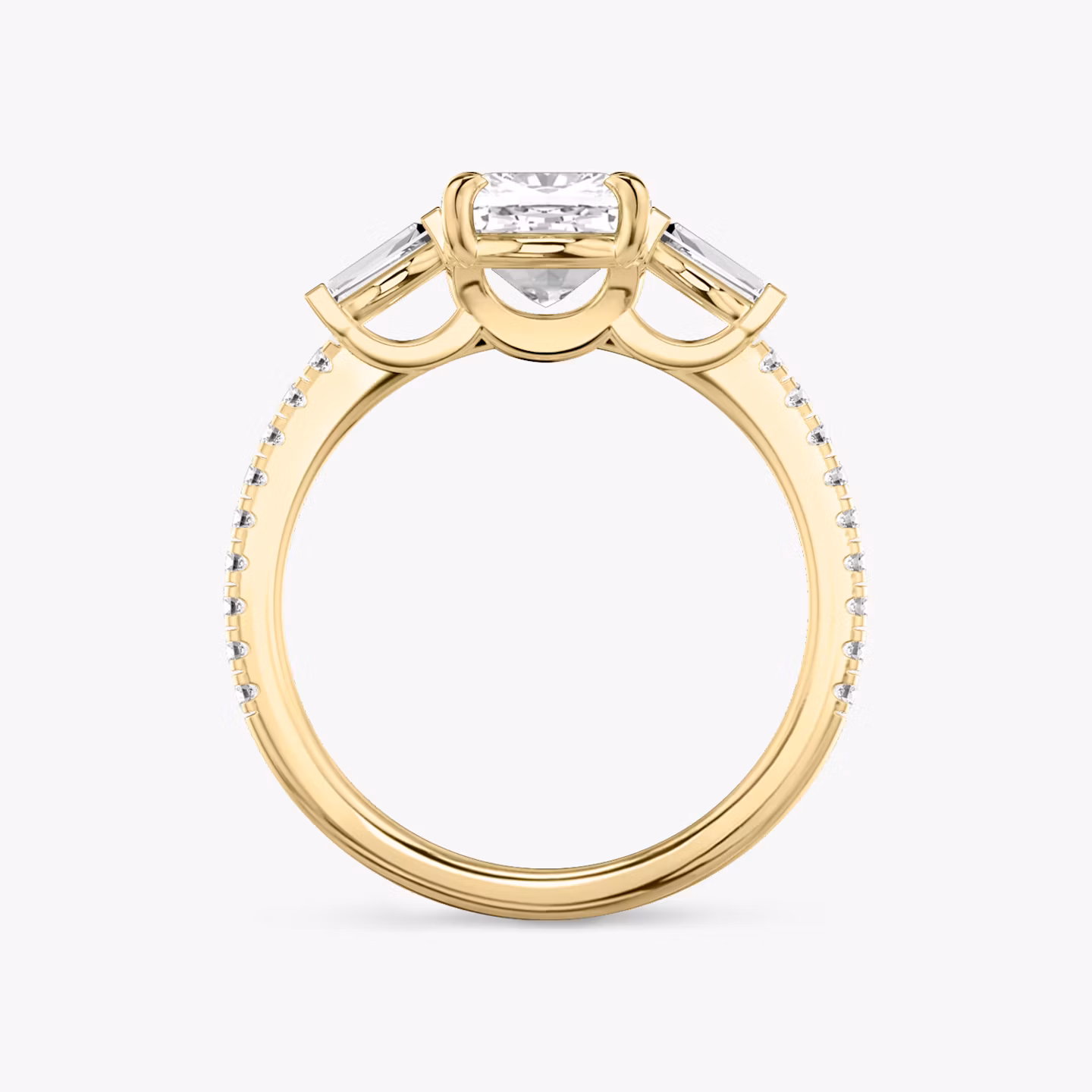 The Three Stone | Cushion | 18k | Yellow Gold | bandAccent: Pavé | sideStoneCarat: 0.10ct | sideStoneShape: Tapered Baguette | diamondOrientation: vertical | caratWeight: other