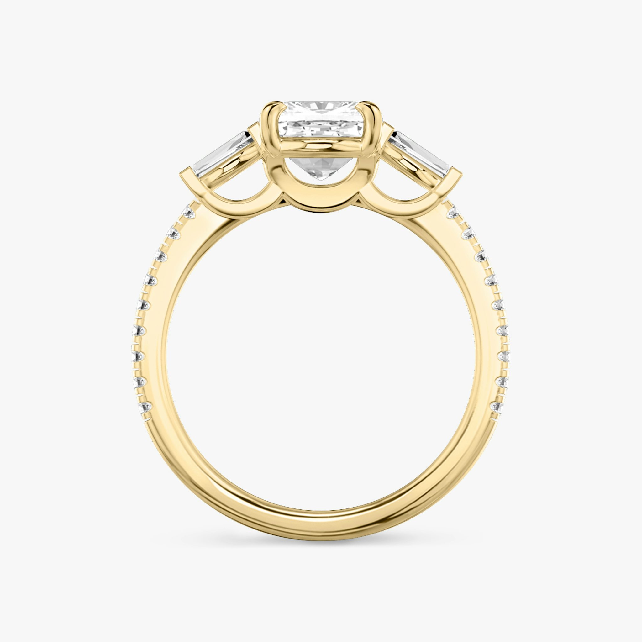 The Three Stone | Cushion | 18k | Yellow Gold | bandAccent: Pavé | sideStoneCarat: 0.10ct | sideStoneShape: Tapered Baguette | diamondOrientation: vertical | caratWeight: other