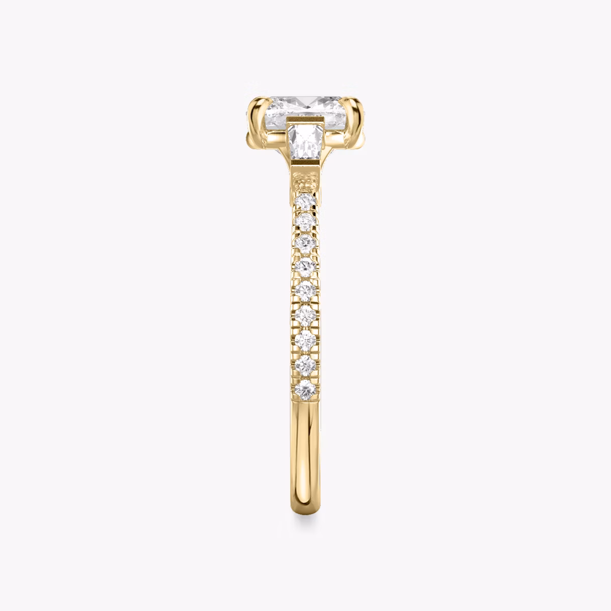 The Three Stone | Cushion | 18k | Yellow Gold | bandAccent: Pavé | sideStoneCarat: 0.10ct | sideStoneShape: Tapered Baguette | diamondOrientation: vertical | caratWeight: other
