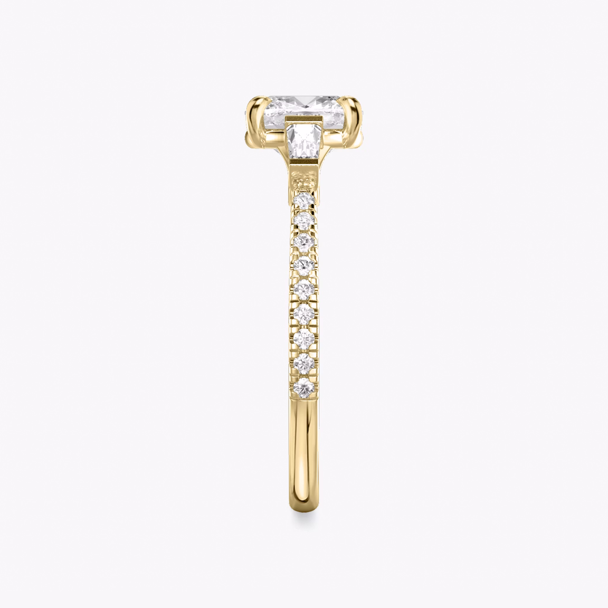 The Three Stone | Cushion | 18k | Yellow Gold | bandAccent: Pavé | sideStoneCarat: 0.10ct | sideStoneShape: Tapered Baguette | diamondOrientation: vertical | caratWeight: other
