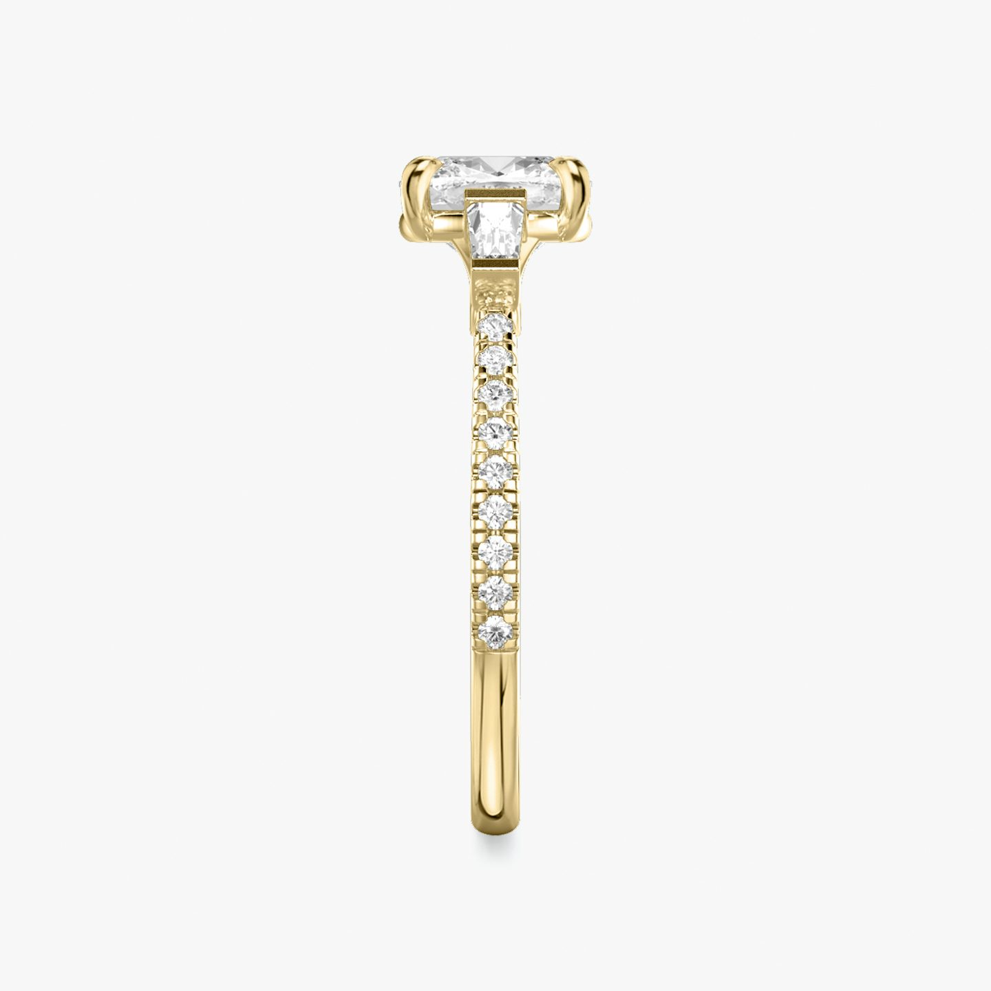 The Three Stone | Cushion | 18k | Yellow Gold | bandAccent: Pavé | sideStoneCarat: 0.10ct | sideStoneShape: Tapered Baguette | diamondOrientation: vertical | caratWeight: other