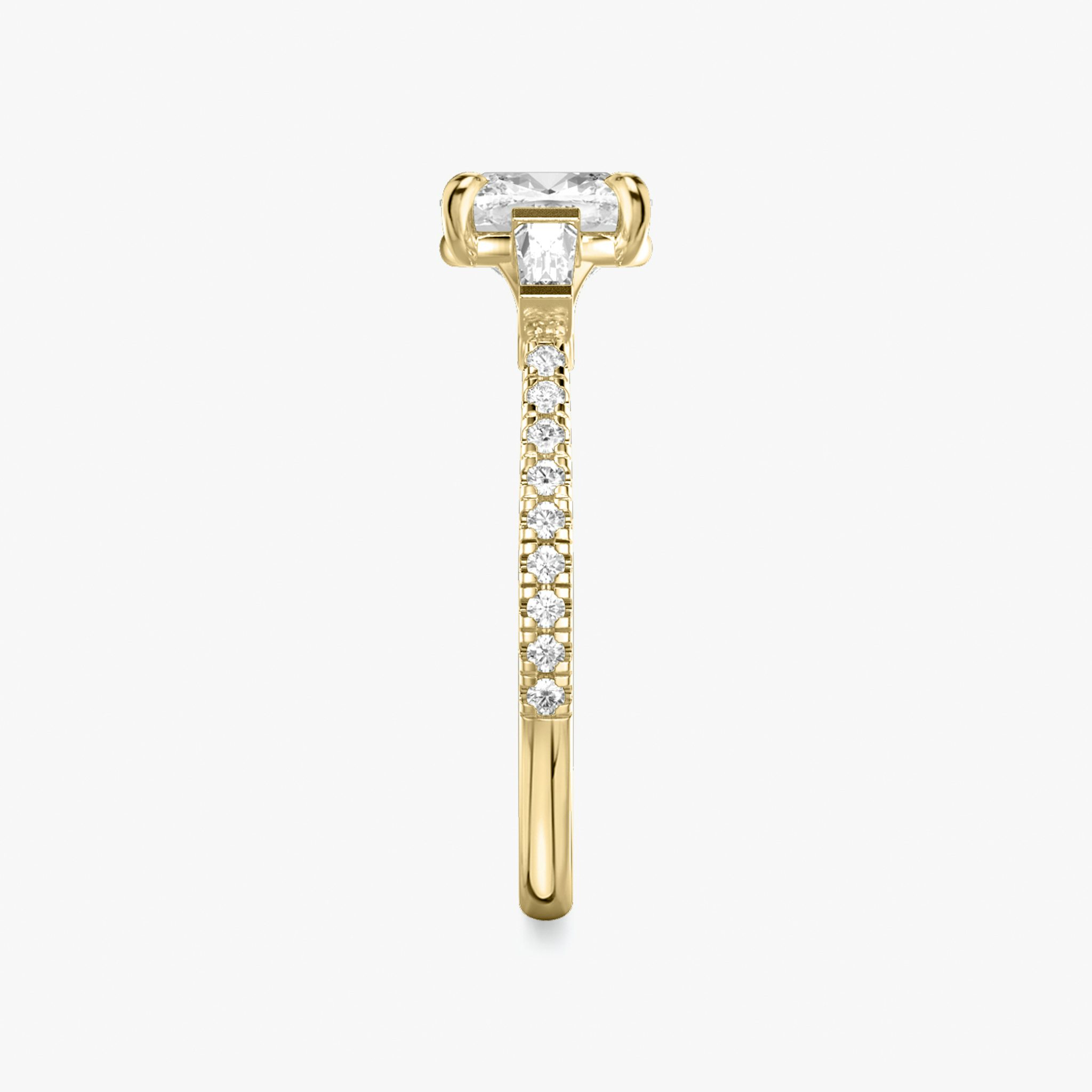 The Three Stone | Cushion | 18k | Yellow Gold | bandAccent: Pavé | sideStoneCarat: 0.10ct | sideStoneShape: Tapered Baguette | diamondOrientation: vertical | caratWeight: other