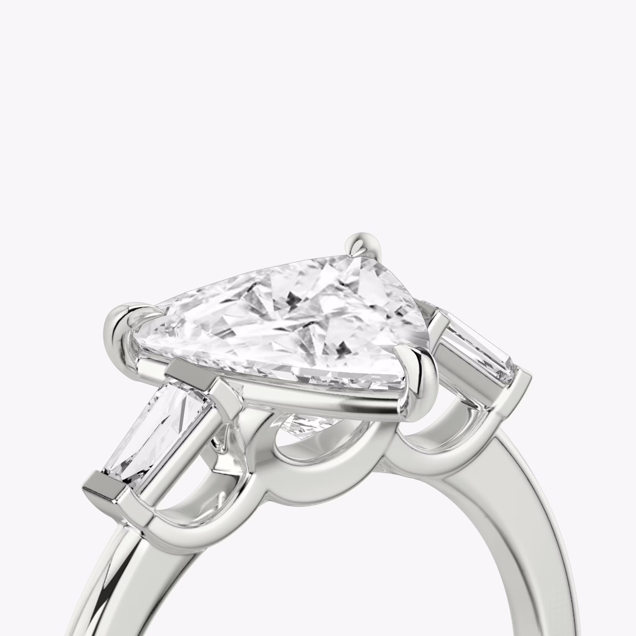The Three Stone | Trillion | 18k | White Gold | bandAccent: Plain | sideStoneCarat: 0.10ct | sideStoneShape: Tapered Baguette | diamondOrientation: vertical | caratWeight: other