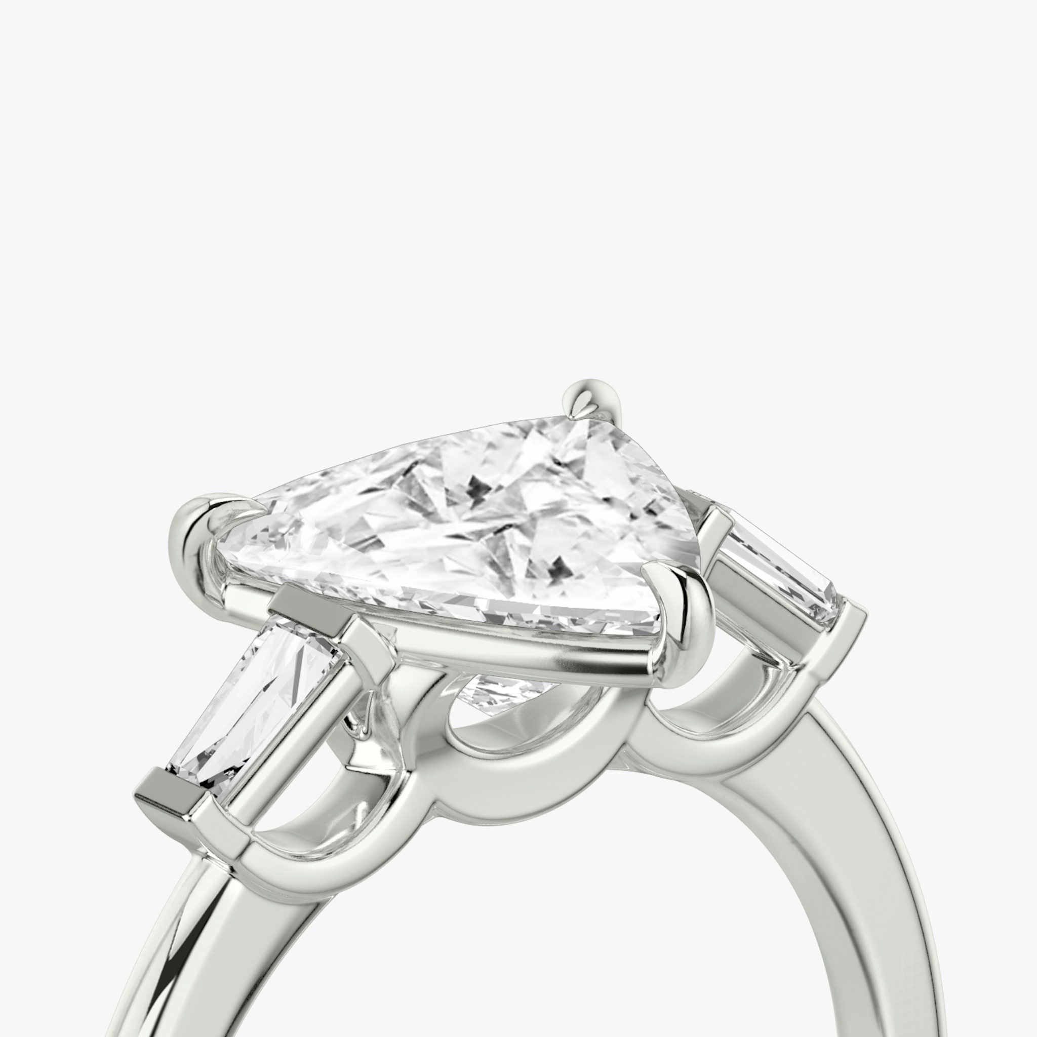 The Three Stone | Trillion | 18k | White Gold | bandAccent: Plain | sideStoneCarat: 0.10ct | sideStoneShape: Tapered Baguette | diamondOrientation: vertical | caratWeight: other
