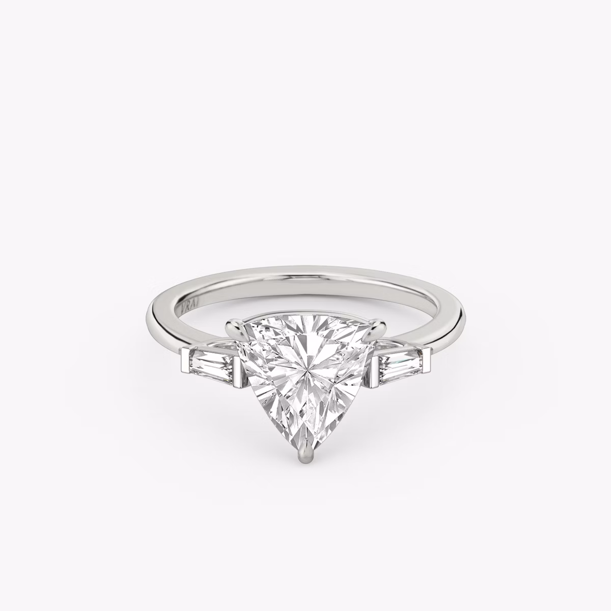 The Three Stone | Trillion | 18k | White Gold | bandAccent: Plain | sideStoneCarat: 0.10ct | sideStoneShape: Tapered Baguette | diamondOrientation: vertical | caratWeight: other