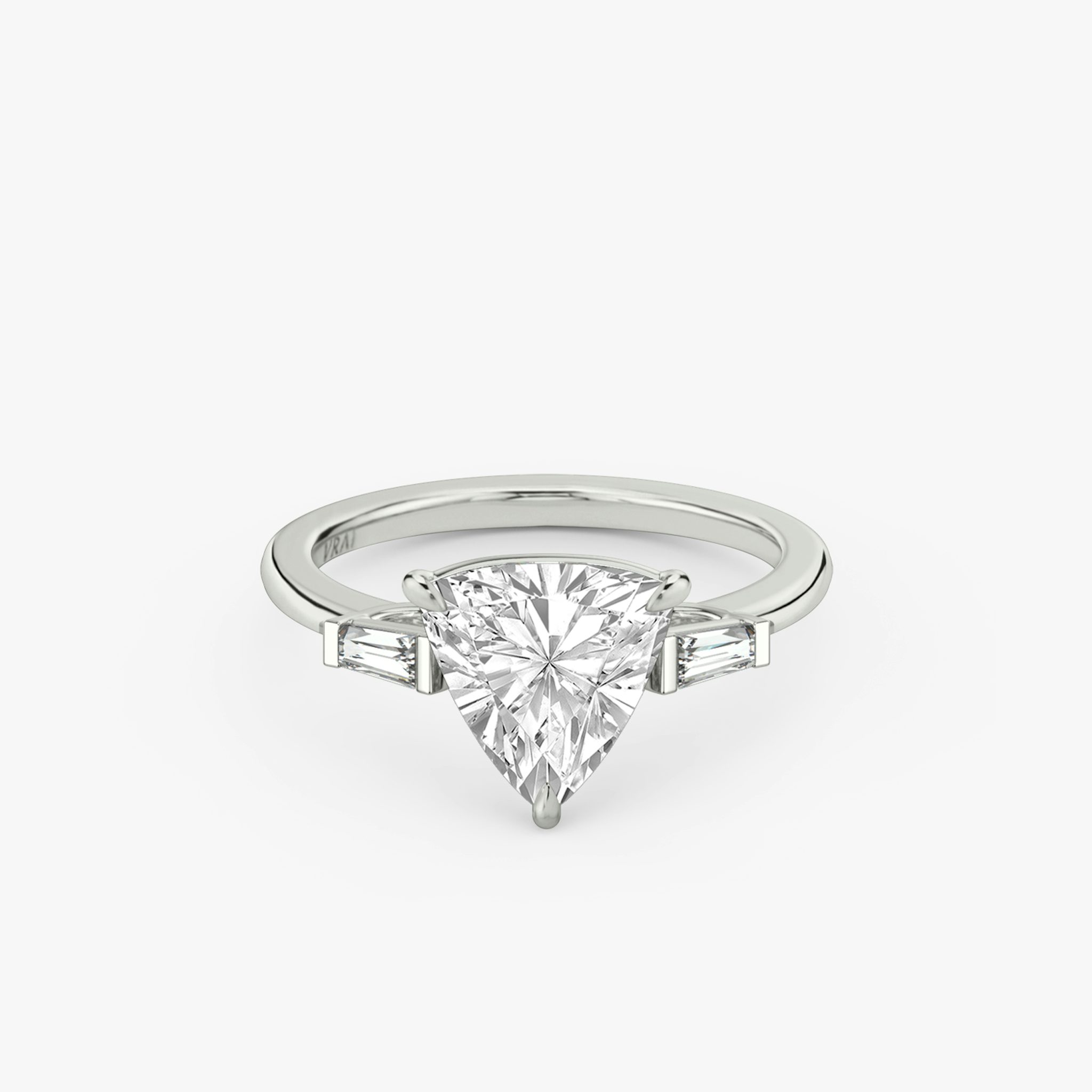 The Three Stone | Trillion | 18k | White Gold | bandAccent: Plain | sideStoneCarat: 0.10ct | sideStoneShape: Tapered Baguette | diamondOrientation: vertical | caratWeight: other