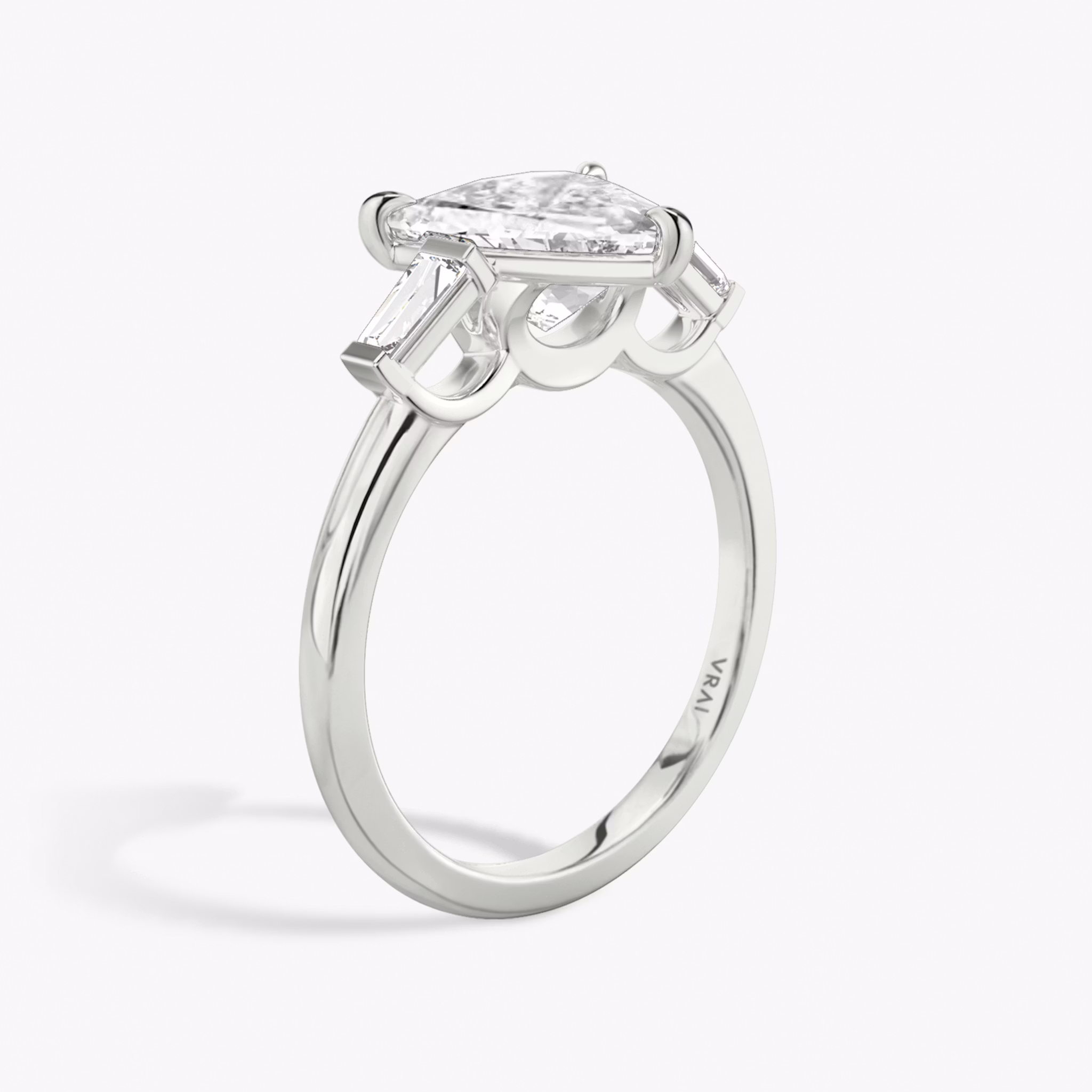 The Three Stone | Trillion | 18k | White Gold | bandAccent: Plain | sideStoneCarat: 0.10ct | sideStoneShape: Tapered Baguette | diamondOrientation: vertical | caratWeight: other