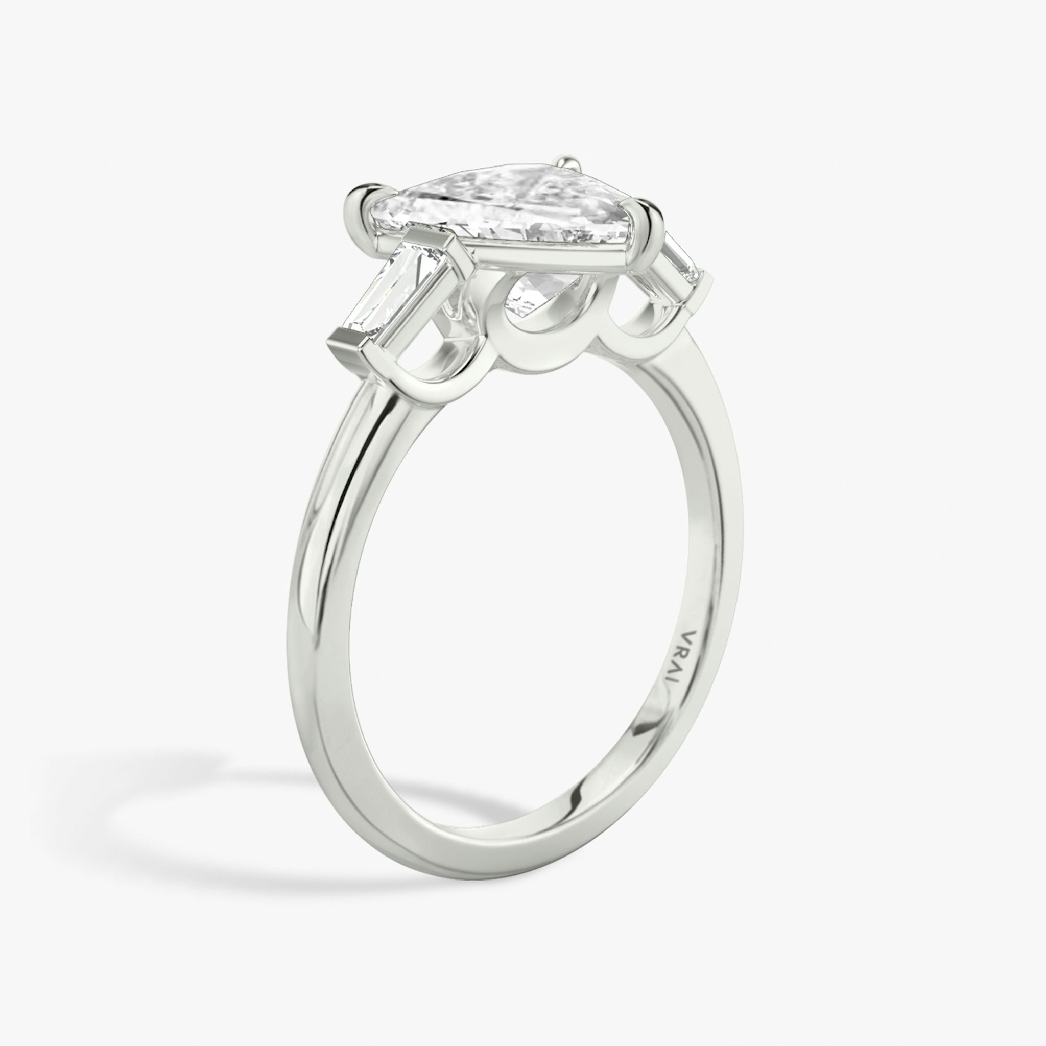 The Three Stone | Trillion | 18k | White Gold | bandAccent: Plain | sideStoneCarat: 0.10ct | sideStoneShape: Tapered Baguette | diamondOrientation: vertical | caratWeight: other