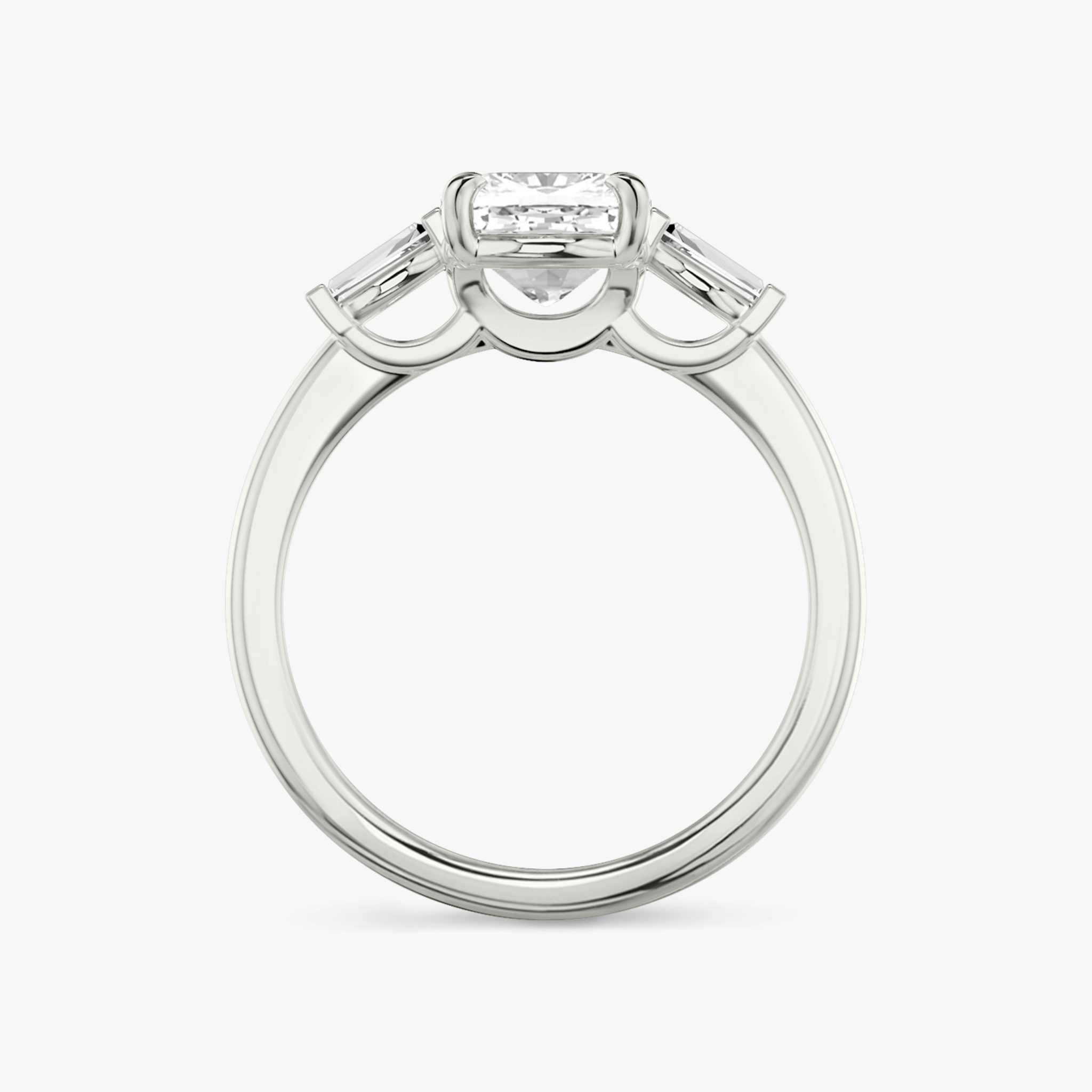 The Three Stone | Cushion | 18k | White Gold | bandAccent: Plain | sideStoneCarat: 0.10ct | sideStoneShape: Tapered Baguette | diamondOrientation: vertical | caratWeight: other