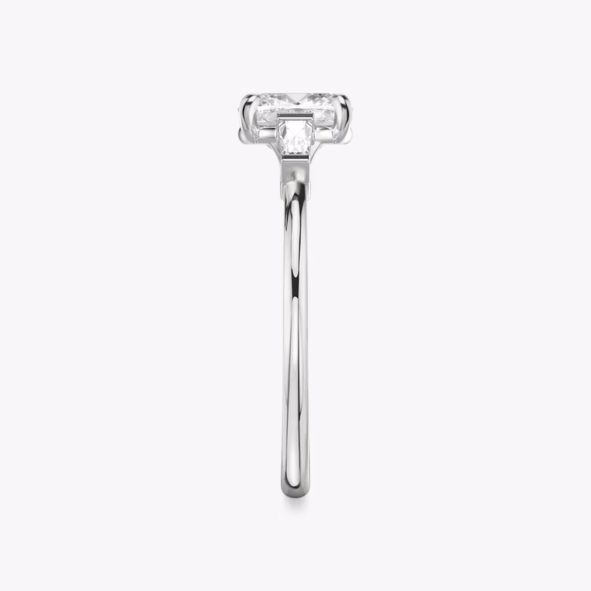 The Three Stone | Cushion | Platinum | bandAccent: Plain | sideStoneCarat: 0.10ct | sideStoneShape: Tapered Baguette | diamondOrientation: vertical | caratWeight: other