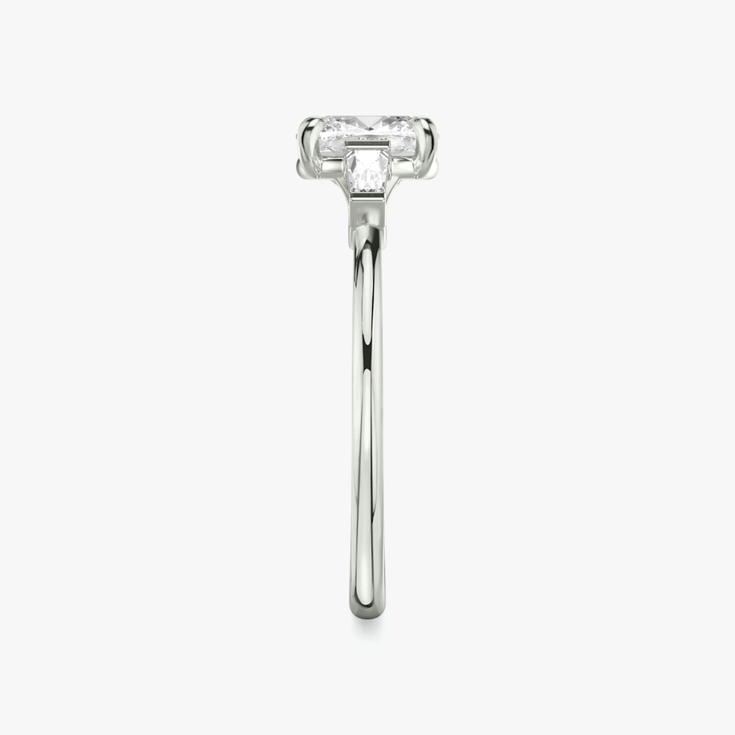 The Three Stone | Cushion | Platinum | bandAccent: Plain | sideStoneCarat: 0.10ct | sideStoneShape: Tapered Baguette | diamondOrientation: vertical | caratWeight: other