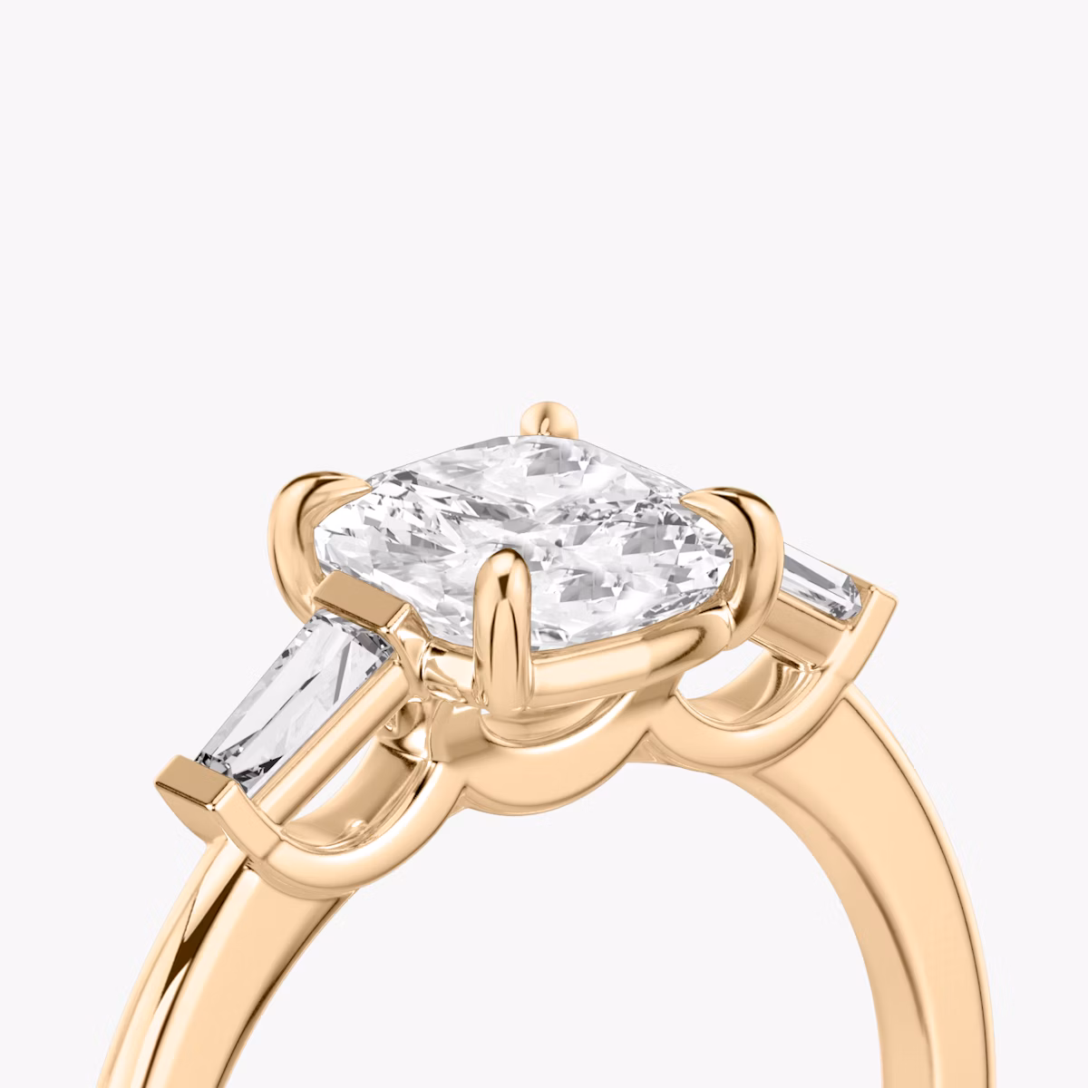 The Three Stone | Cushion | 14k | Rose Gold | bandAccent: Plain | sideStoneCarat: 0.10ct | sideStoneShape: Tapered Baguette | diamondOrientation: vertical | caratWeight: other
