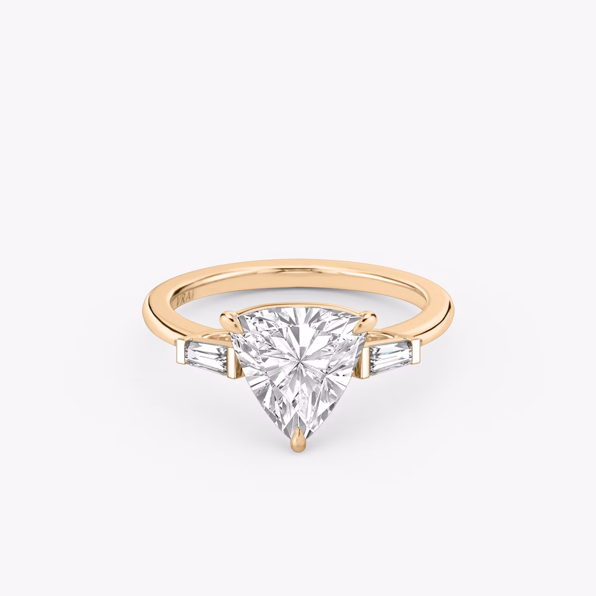 The Three Stone | Trillion | 14k | Rose Gold | bandAccent: Plain | sideStoneCarat: 0.10ct | sideStoneShape: Tapered Baguette | diamondOrientation: vertical | caratWeight: other