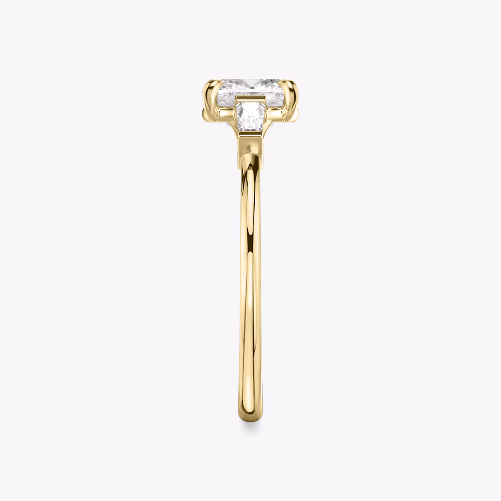 The Three Stone | Cushion | 18k | Yellow Gold | bandAccent: Plain | sideStoneCarat: 0.10ct | sideStoneShape: Tapered Baguette | diamondOrientation: vertical | caratWeight: other