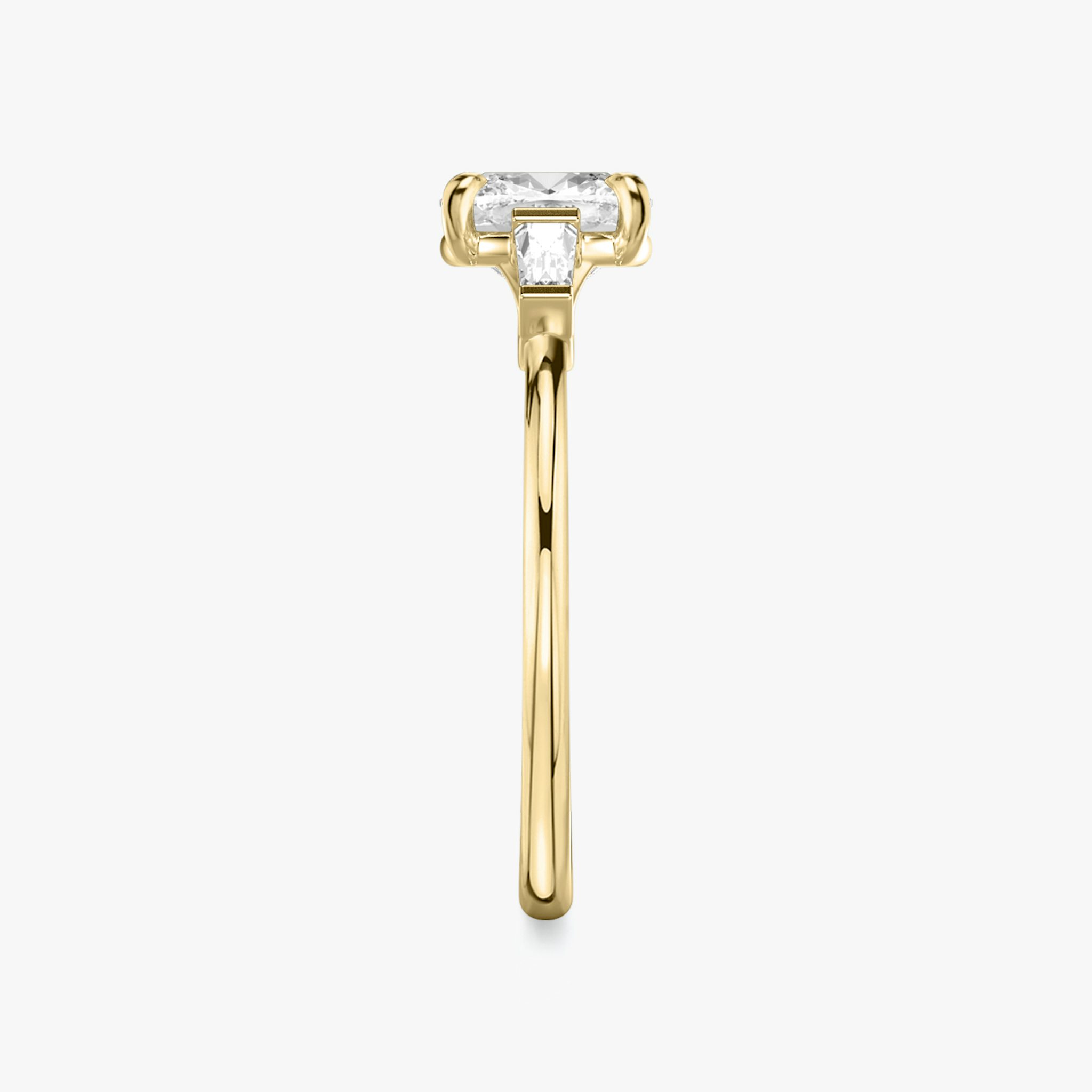 The Three Stone | Cushion | 18k | Yellow Gold | bandAccent: Plain | sideStoneCarat: 0.10ct | sideStoneShape: Tapered Baguette | diamondOrientation: vertical | caratWeight: other
