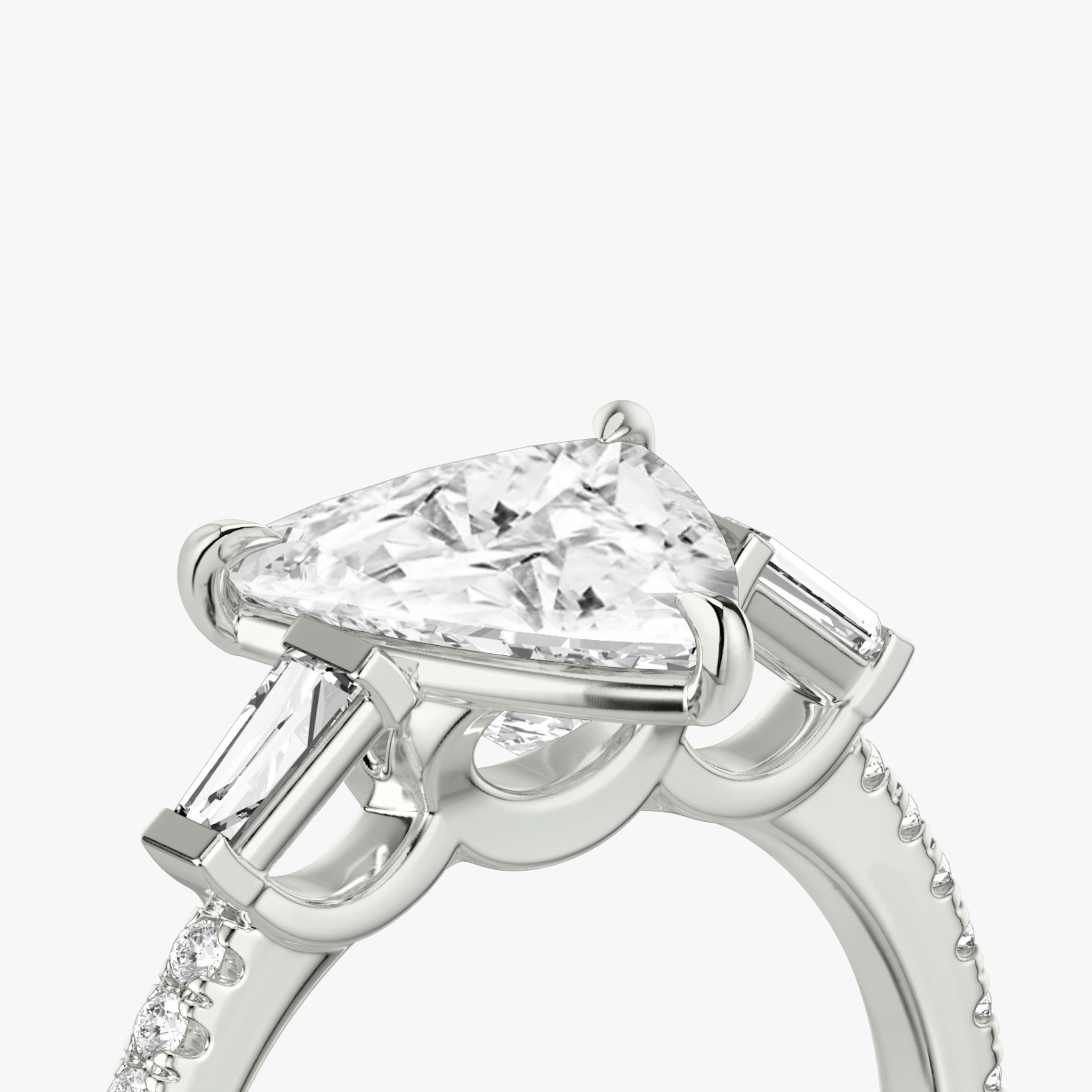 The Three Stone | Trillion | 18k | White Gold | bandAccent: Pavé | sideStoneCarat: 0.10ct | sideStoneShape: Tapered Baguette | diamondOrientation: vertical | caratWeight: other