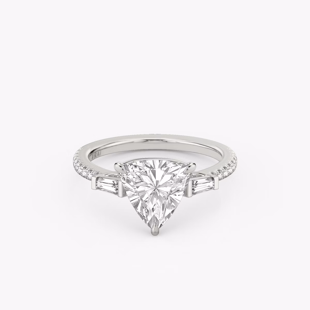 The Three Stone | Trillion | Platinum | bandAccent: Pavé | sideStoneCarat: 0.10ct | sideStoneShape: Tapered Baguette | diamondOrientation: vertical | caratWeight: other