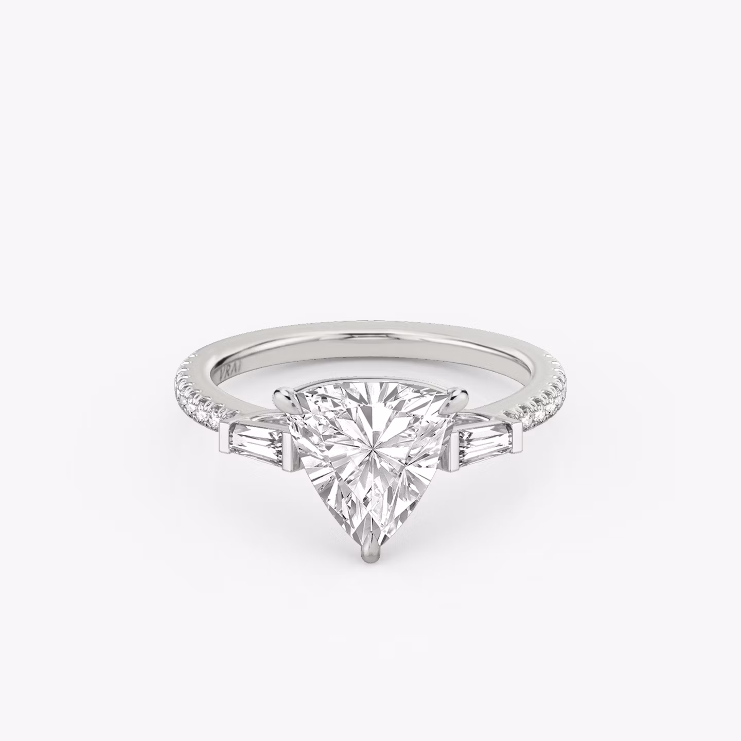 The Three Stone | Trillion | Platinum | bandAccent: Pavé | sideStoneCarat: 0.10ct | sideStoneShape: Tapered Baguette | diamondOrientation: vertical | caratWeight: other