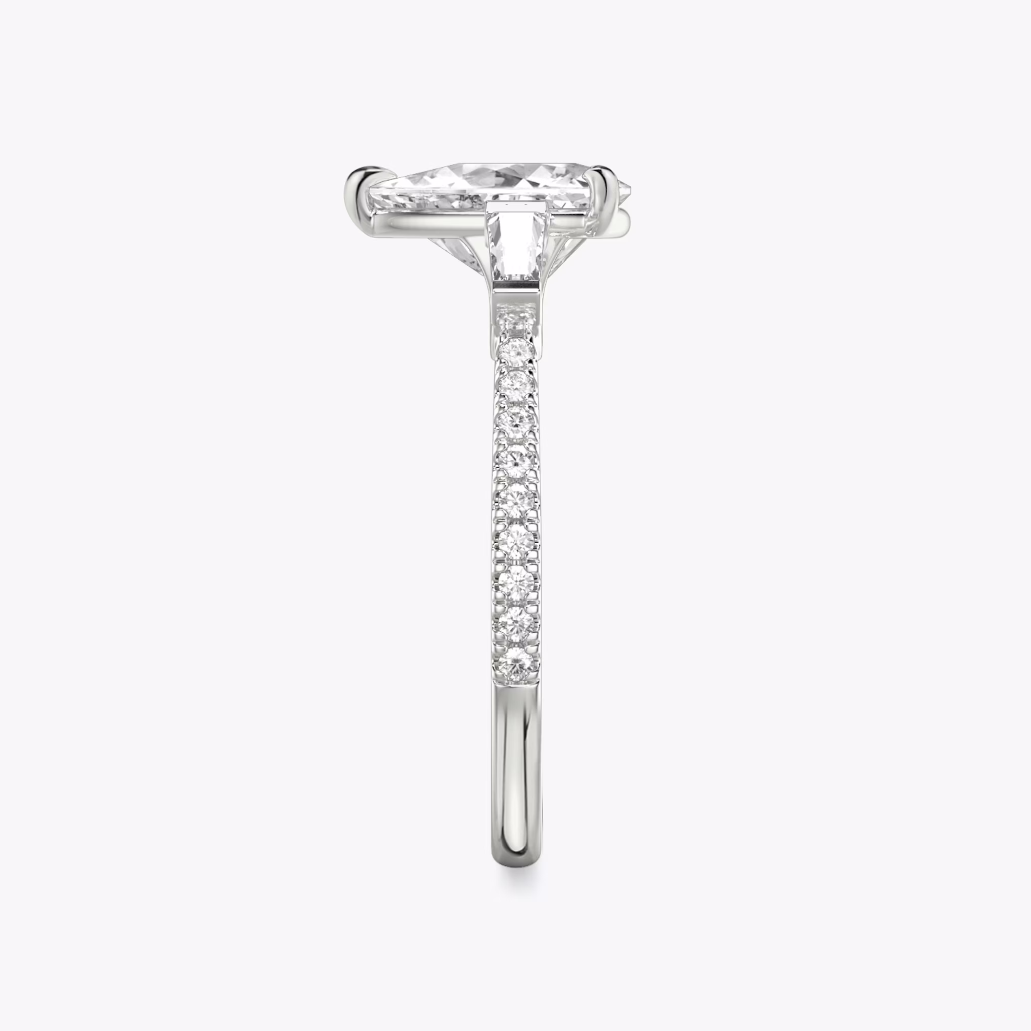 The Three Stone | Trillion | 18k | White Gold | bandAccent: Pavé | sideStoneCarat: 0.10ct | sideStoneShape: Tapered Baguette | diamondOrientation: vertical | caratWeight: other