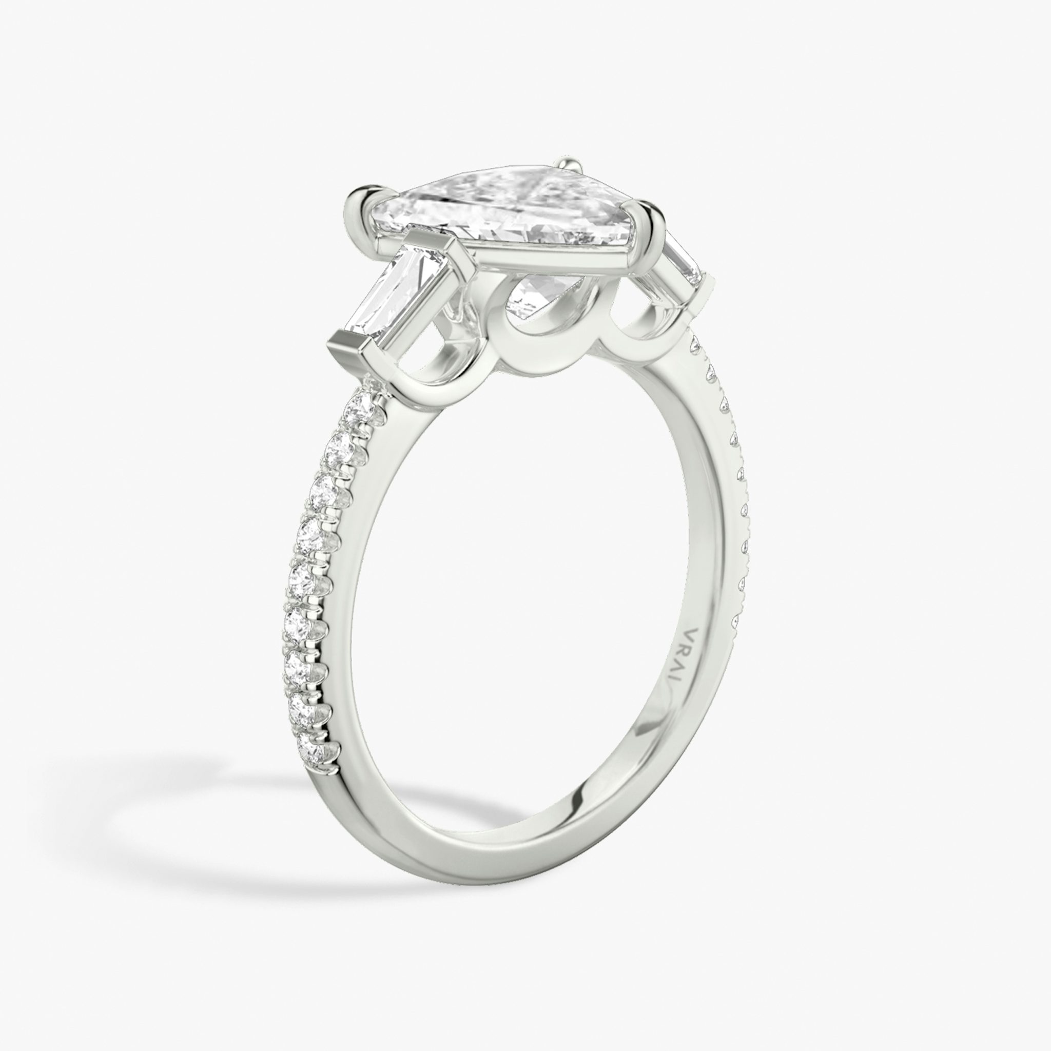 The Three Stone | Trillion | 18k | White Gold | bandAccent: Pavé | sideStoneCarat: 0.10ct | sideStoneShape: Tapered Baguette | diamondOrientation: vertical | caratWeight: other