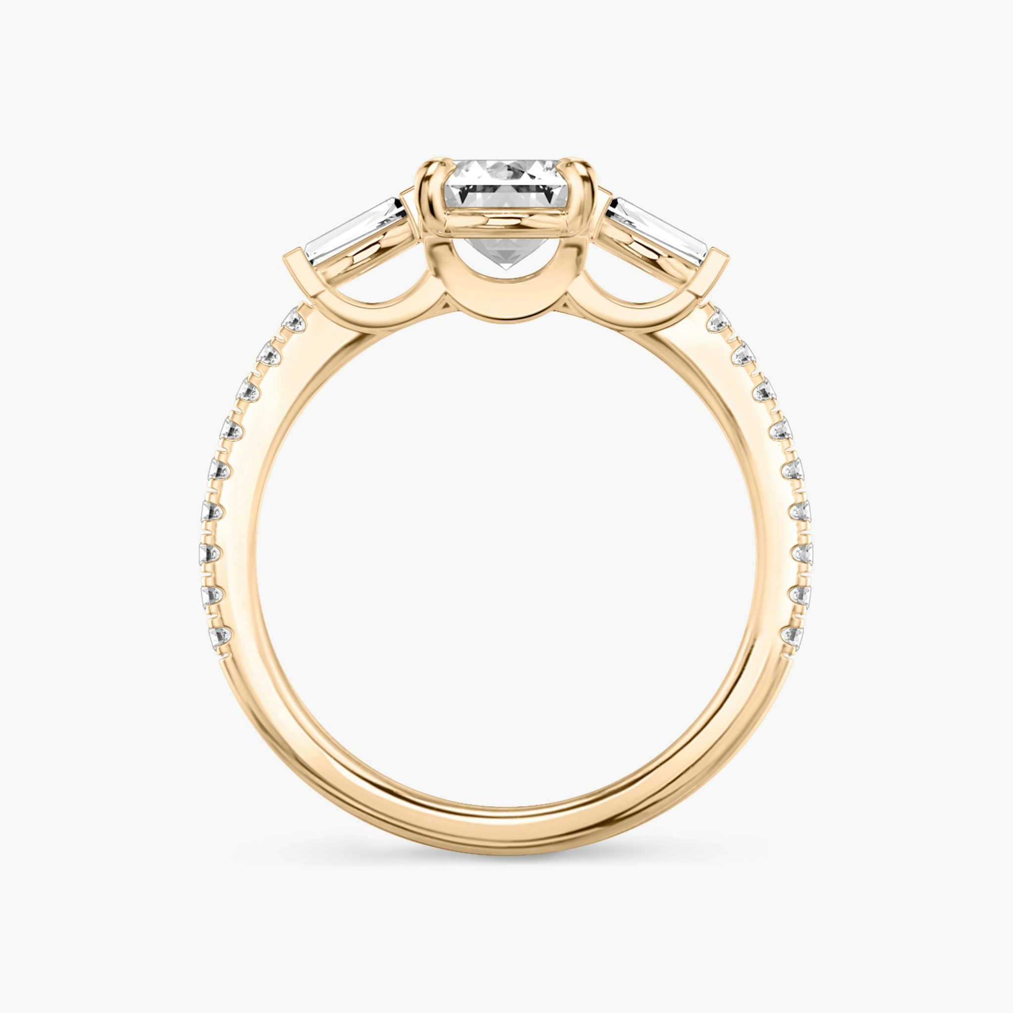The Three Stone | Emerald | 14k | Rose Gold | bandAccent: Pavé | sideStoneCarat: 0.10ct | sideStoneShape: Tapered Baguette | diamondOrientation: vertical | caratWeight: other