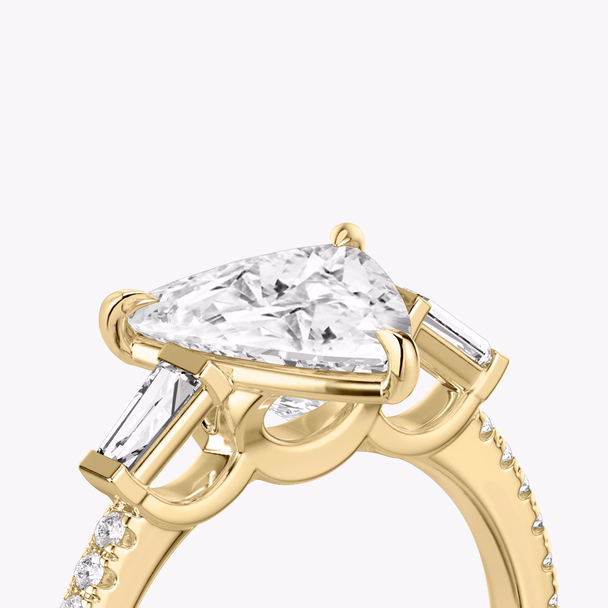 The Three Stone | Trillion | 18k | Yellow Gold | bandAccent: Pavé | sideStoneCarat: 0.10ct | sideStoneShape: Tapered Baguette | diamondOrientation: vertical | caratWeight: other