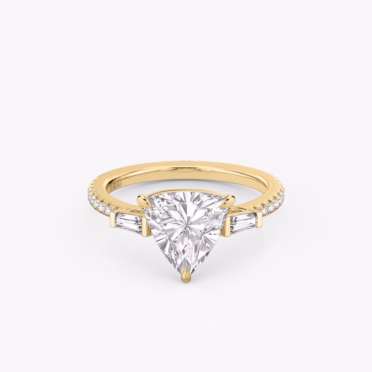 The Three Stone | Trillion | 18k | Yellow Gold | bandAccent: Pavé | sideStoneCarat: 0.10ct | sideStoneShape: Tapered Baguette | diamondOrientation: vertical | caratWeight: other