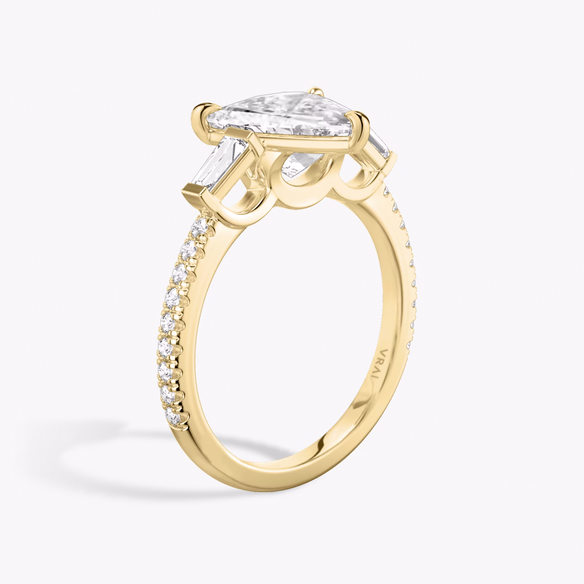 The Three Stone | Trillion | 18k | Yellow Gold | bandAccent: Pavé | sideStoneCarat: 0.10ct | sideStoneShape: Tapered Baguette | diamondOrientation: vertical | caratWeight: other